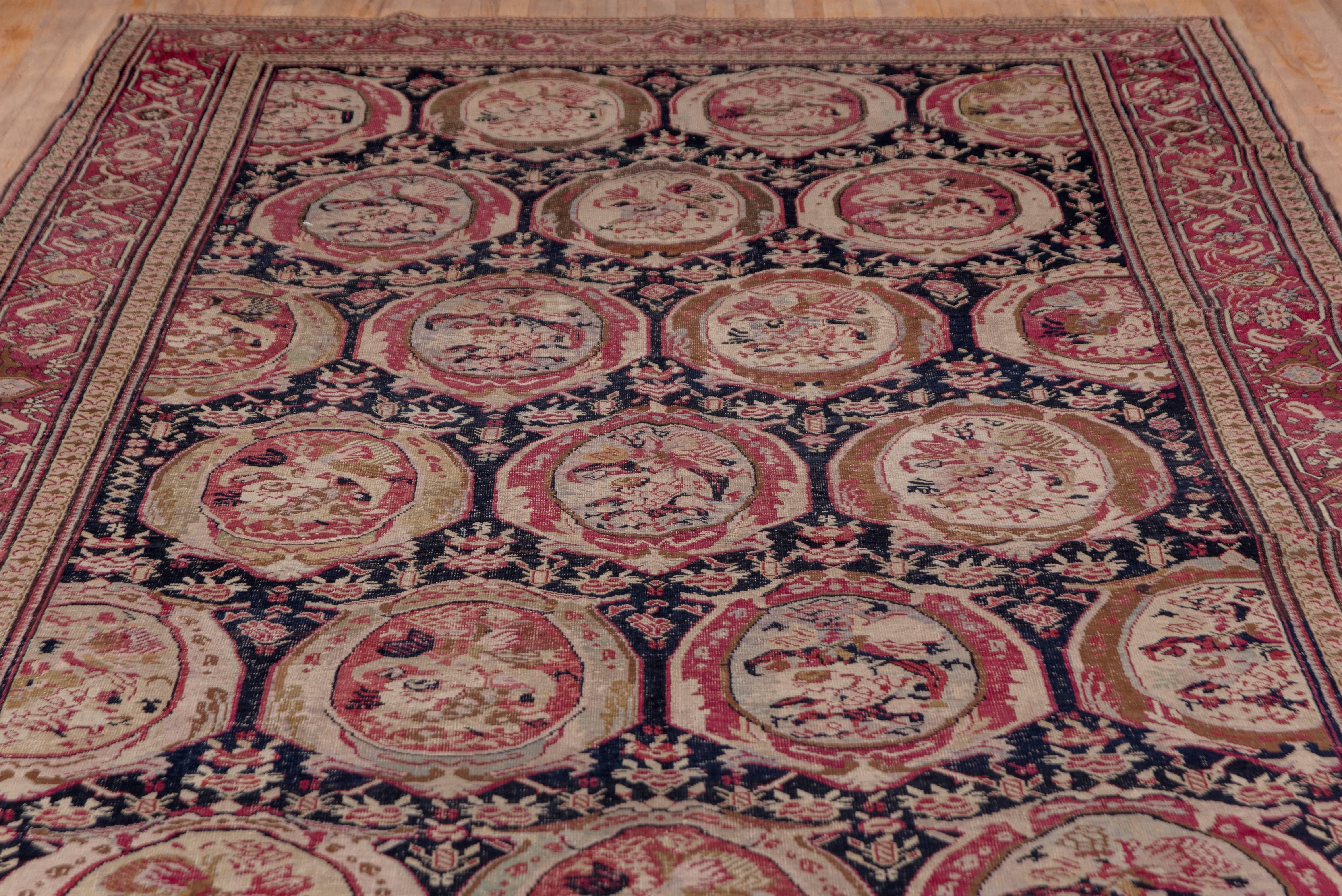 This south Caucasian carpet is in the Russian style with columns of elliptical 