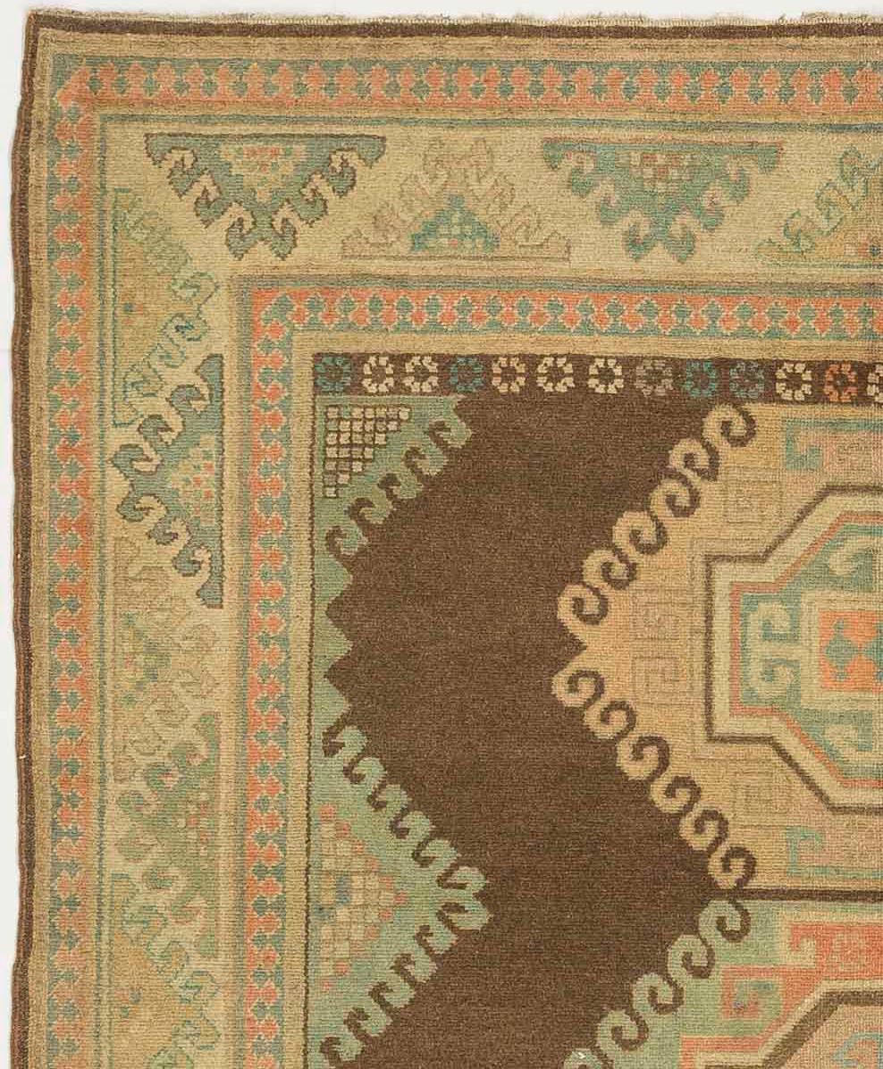 Persian Antique Russian Kazak Rug with Beige & Green Geometric Medallions For Sale