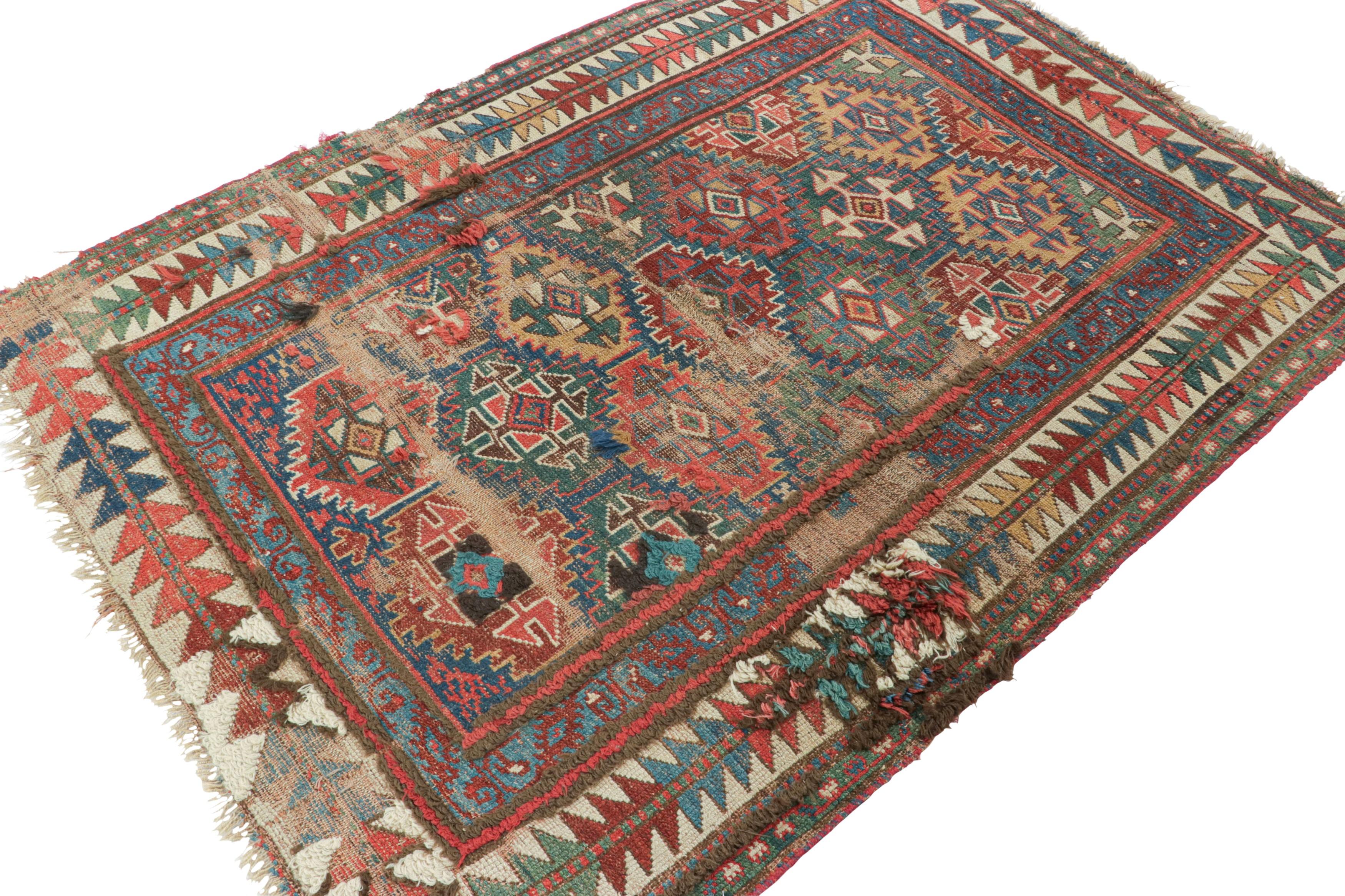 Antique Russian Kazak Rug with Blue and Red Geometric Patterns - Rug & Kilim In Good Condition For Sale In Long Island City, NY