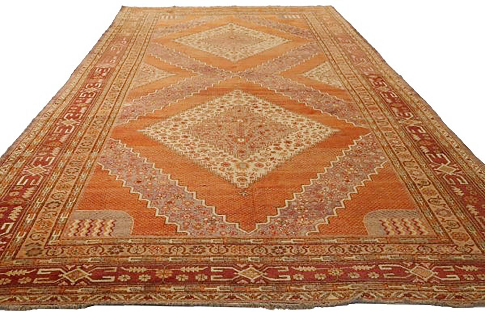 Hand-Woven Antique Russian Khotan Rug with Beige and Brown Diamond Medallions For Sale
