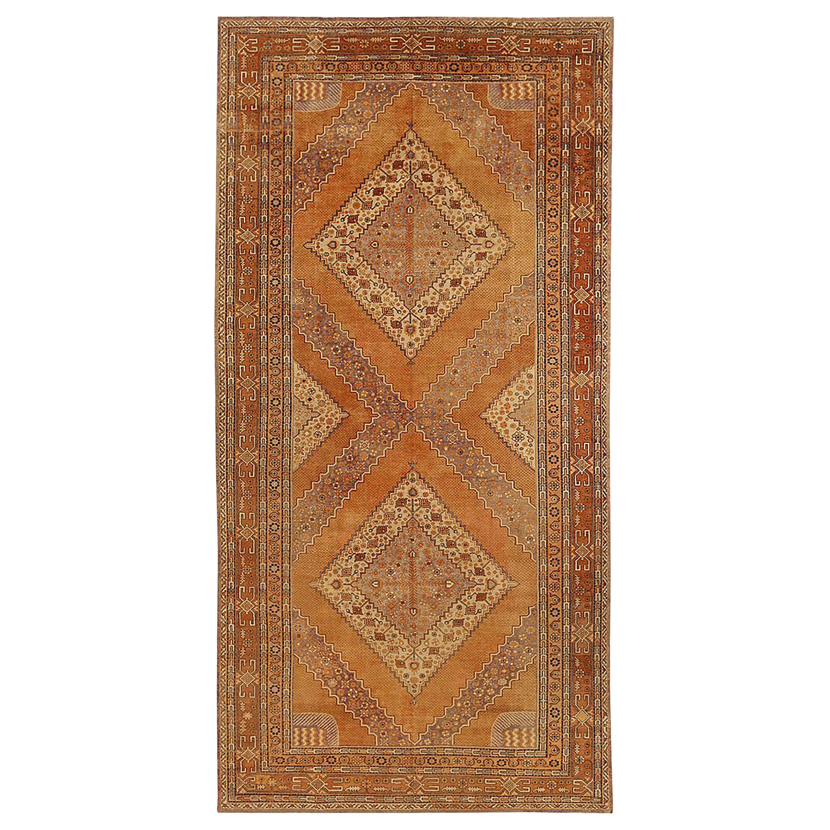 Antique Russian Khotan Rug with Beige and Brown Diamond Medallions For Sale