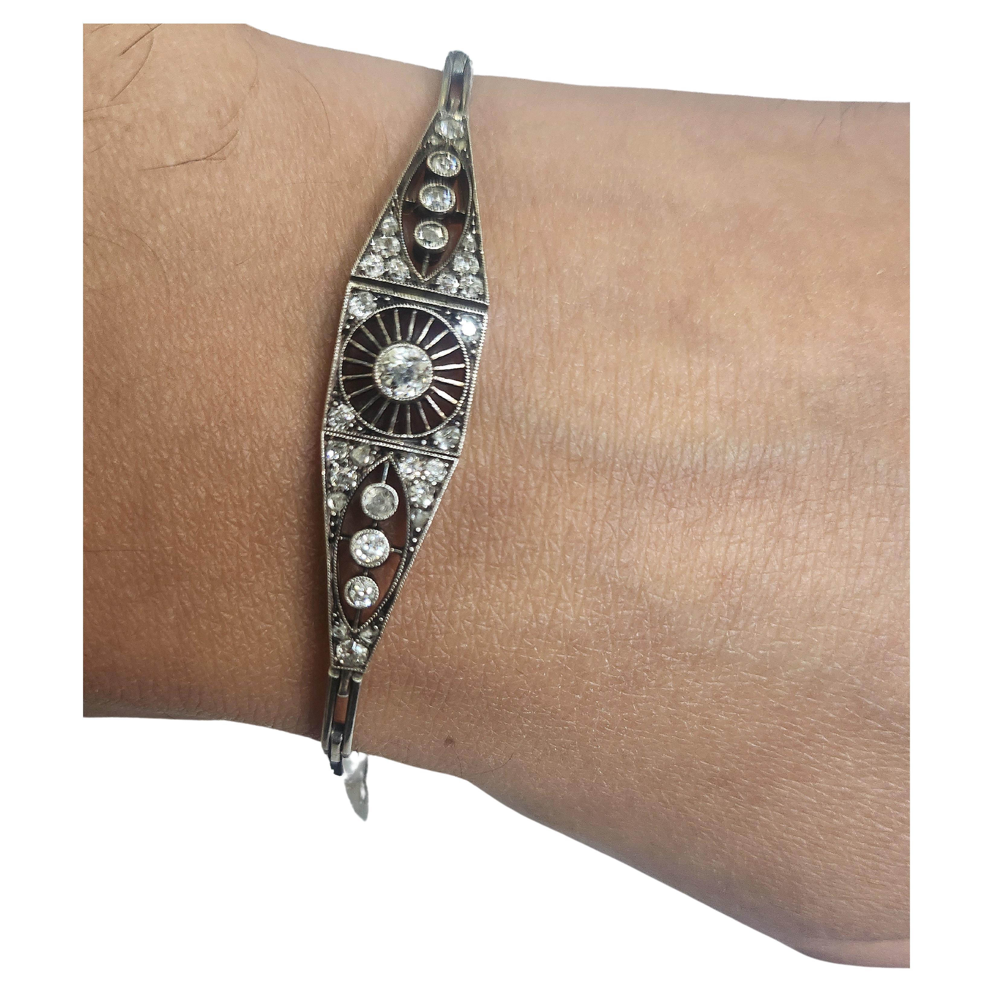Early soviet era moscow city 1917/1920s link bracelet in open work style with estimade old mine cut diamond weight 1 carat in 14k gold topped with silver hall marked with gold and silver soviet standards and moscow city assay mark bracelet lenght
