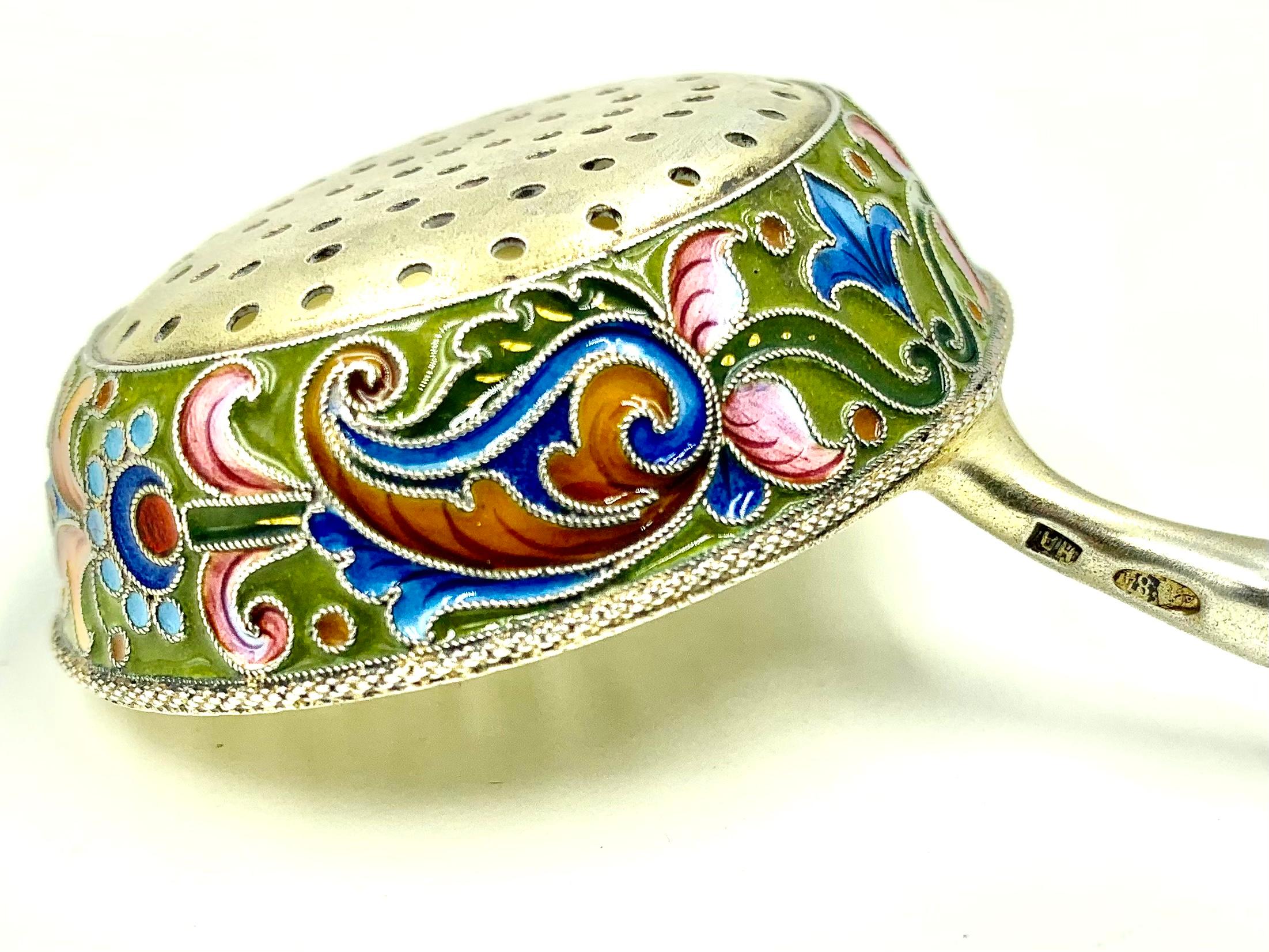 Exceptional quality antique Russian vermeil silver and shaded enamel Pan-Slavic Style tea strainer by Nikolai Alekseyev. The handle decorated in dove grey background with exotic floral motifs executed in pink, lavender, puce, orange and peach shaded