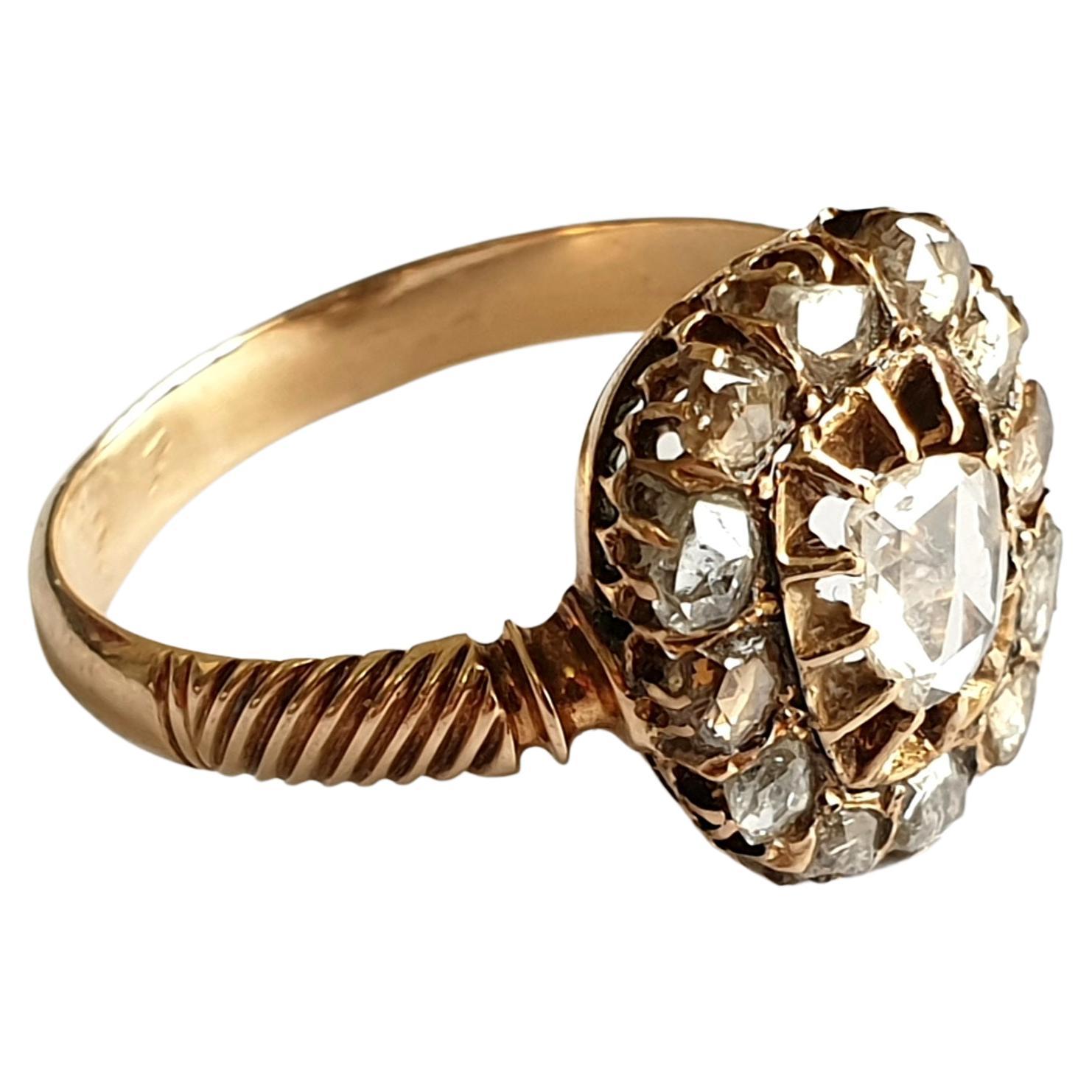 Antique Russian rose cut diamond 14k gold ring centered with single cut rose diamond flanked with several small rose cut diamonds with an estimate diamond weight of 1.5 carats with detailed work on ring band sides hall marked 56 imperial Russian