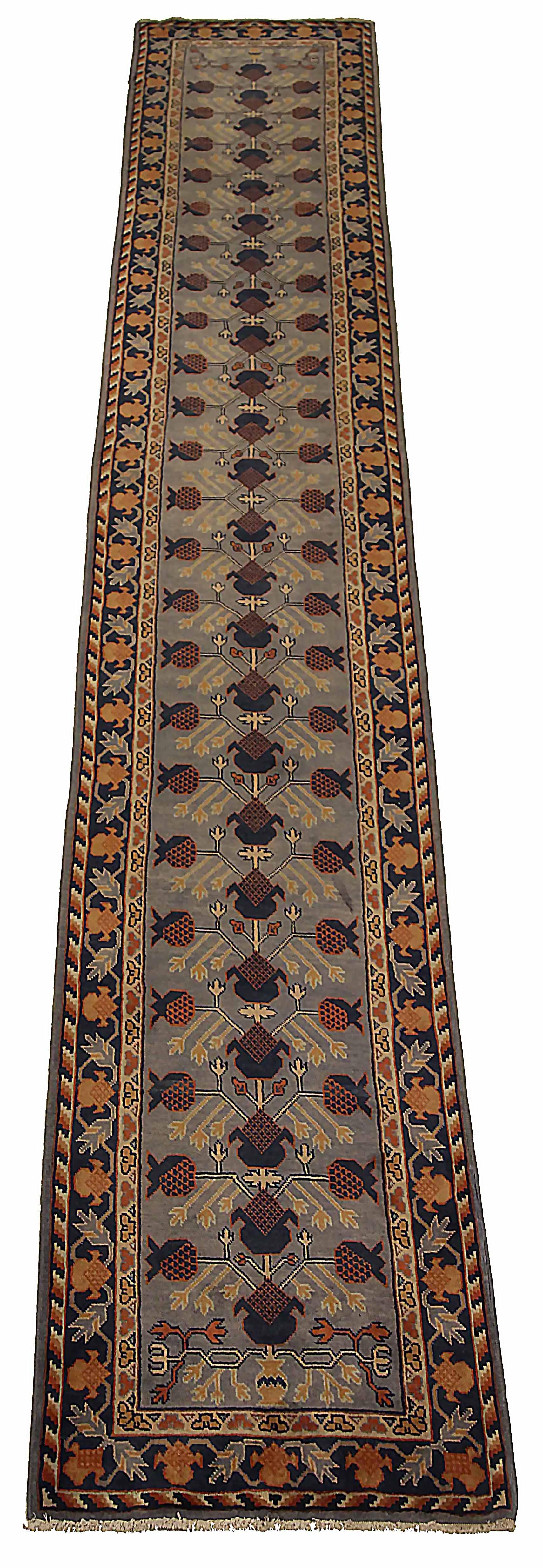 Antique Russian runner rug handwoven from the finest sheep’s wool. It’s colored with all-natural vegetable dyes that are safe for humans and pets. It’s a traditional Khotan design handwoven by expert artisans. It’s a lovely runner rug that can be