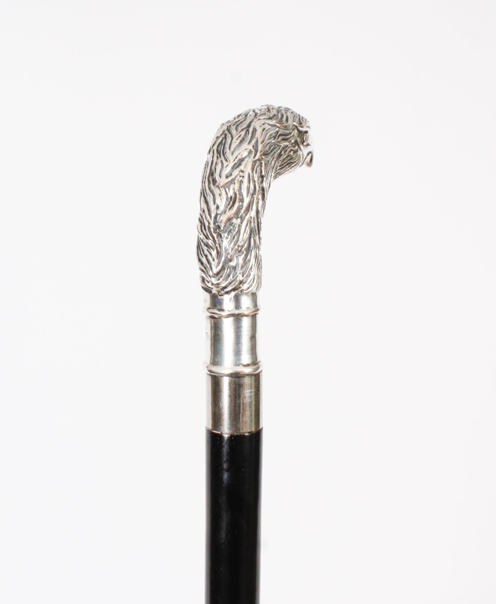 This is a very beautiful antique gentleman's silver eagle mounted walking stick, circa 1880 in date and bearing the impressed makers marks and 800 for silver

The exquisite handle is superbly decorated  with great detail

The handle is directly
