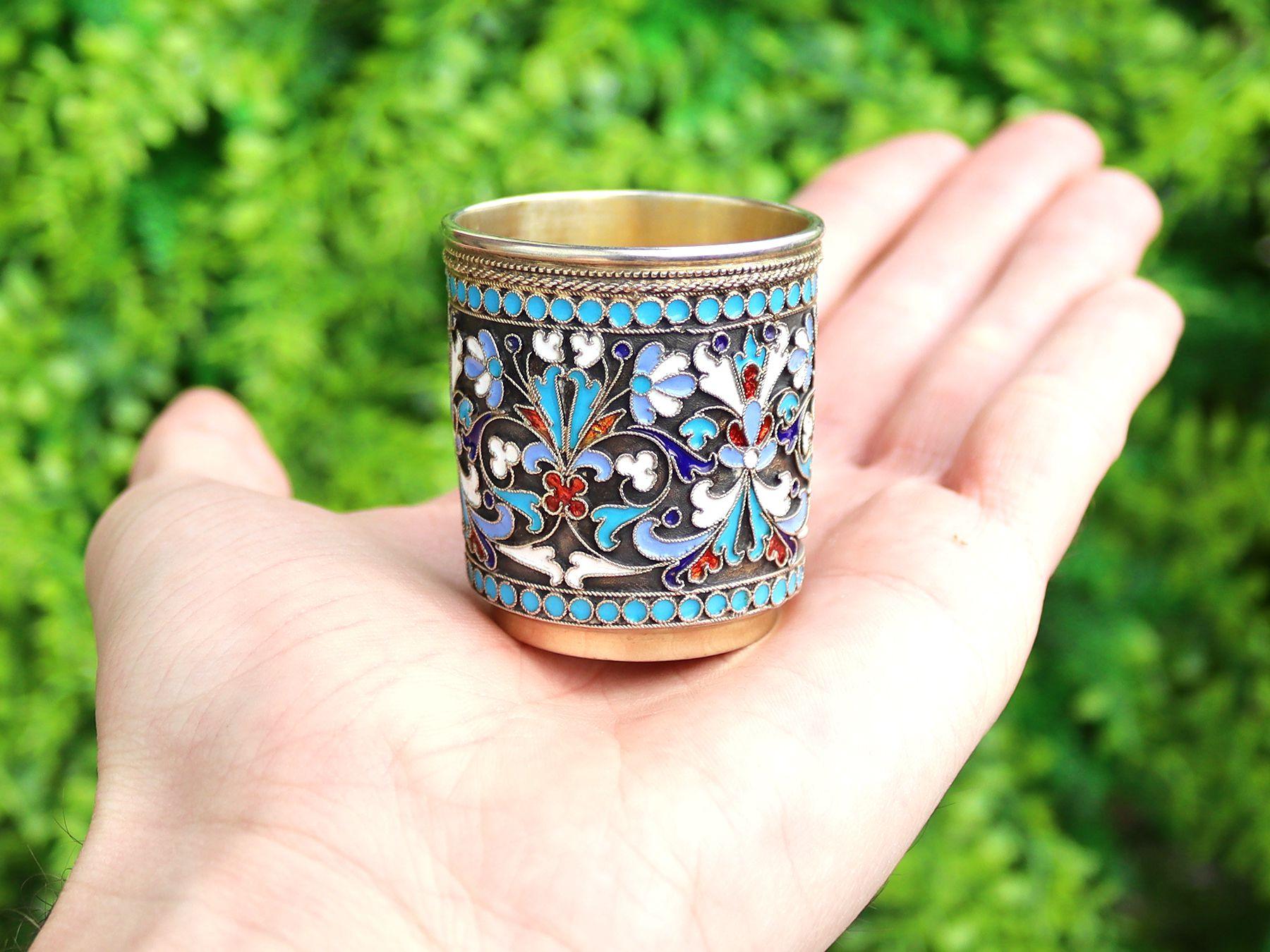 An exceptional, fine and impressive antique Russian silver and polychrome cloisonné enamel vodka cup / beaker; an addition to our range of drinks related silverware.

This exceptional antique Russian silver gilt vodka cup/beaker has a cylindrical