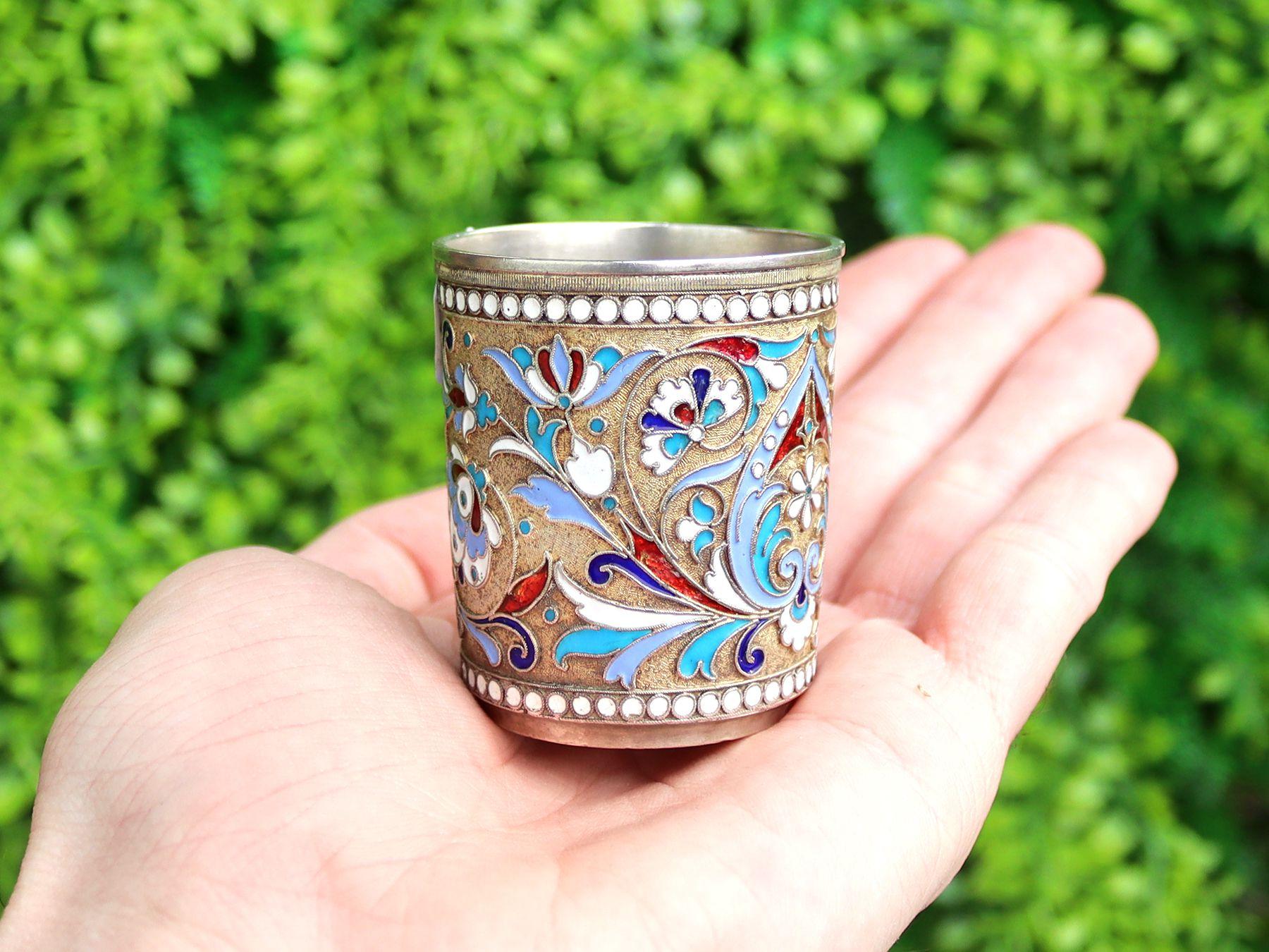 An exceptional, fine and impressive antique Russian silver and polychrome cloisonné enamel vodka cup or beaker: An addition to our range of drinks related silverware.

This exceptional antique Russian silver gilt vodka cup or beaker has a