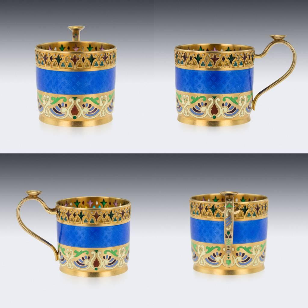 Antique 19th century imperial Russian solid silver and guilloche enamel demitasse cup with saucer, in dark blue, with plique-a-jour borders and with bands of translucent enamel over guilloché grounds, the centres of the saucers and the lower borders
