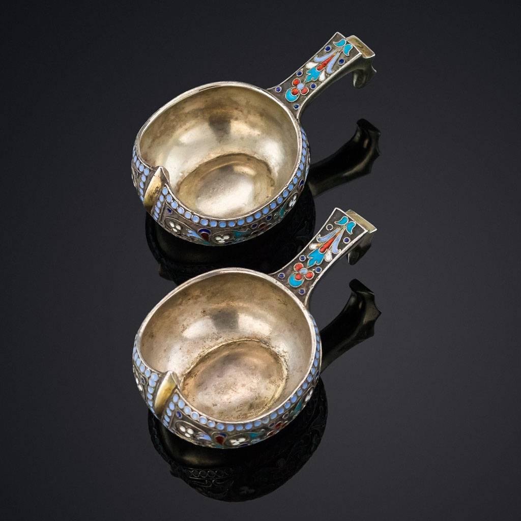 Description:

Antique 19th century rare pair of Imperial Russian solid silver and cloisonné enamel kovsh's, of traditional oval form with raised prow and hook handle, beautifully decorated with polychrome cloisonné enamel with stylized scrolling