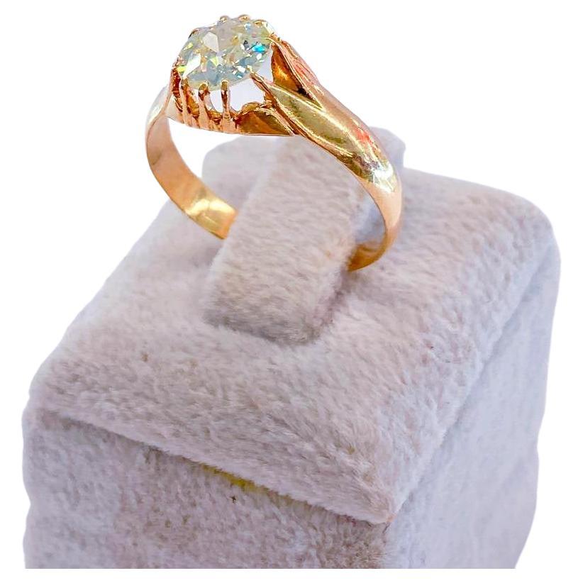Antique Russian diamond solitaire ring centered with 1 old cut diamond with an estimate weight of  1.25 carats (6.9mm) diameter H color white vs clearity excellent spark in rose gold setting ring was made st petersburg during the early imperial