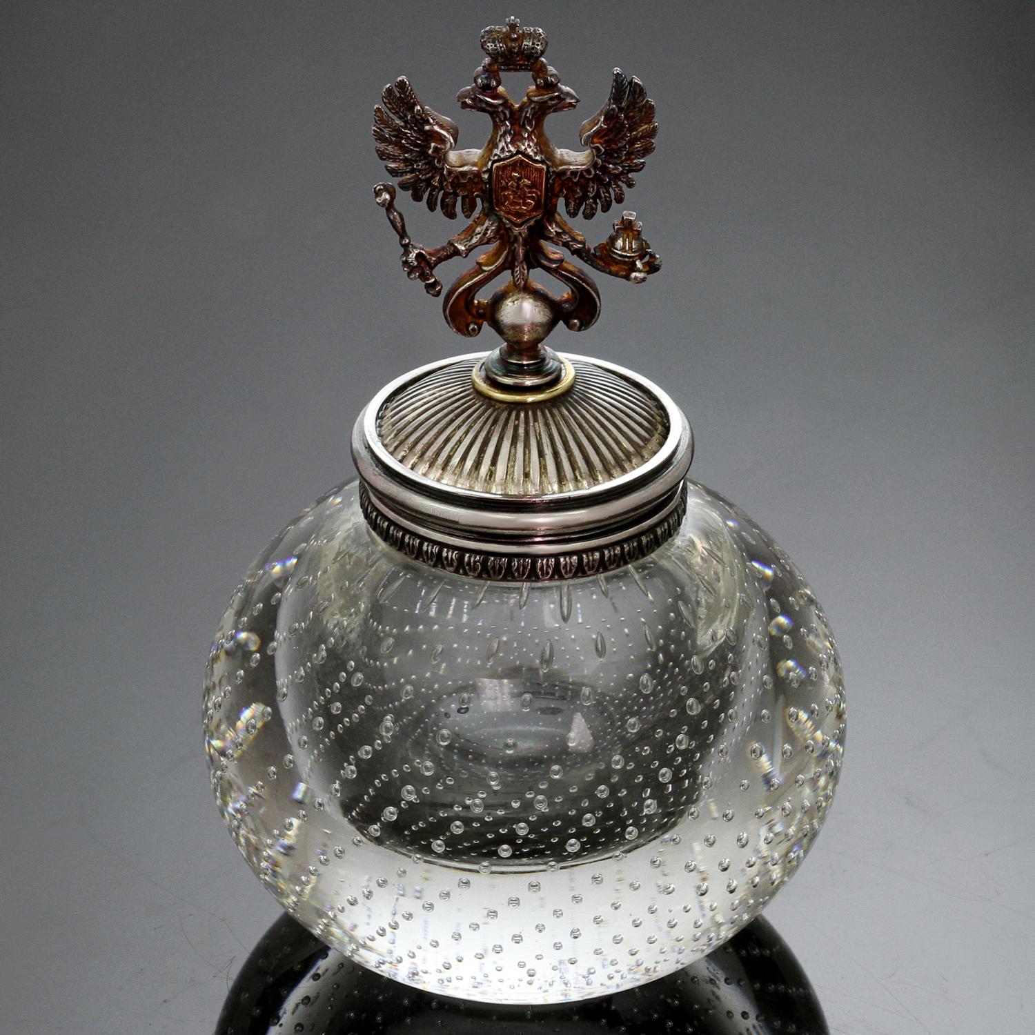 This exquisite Russian Imperial inkwell is crafted out of controlled bubble glass and features a hinged sterling silver double eagle lid. Made in Russia circa early 1900s.