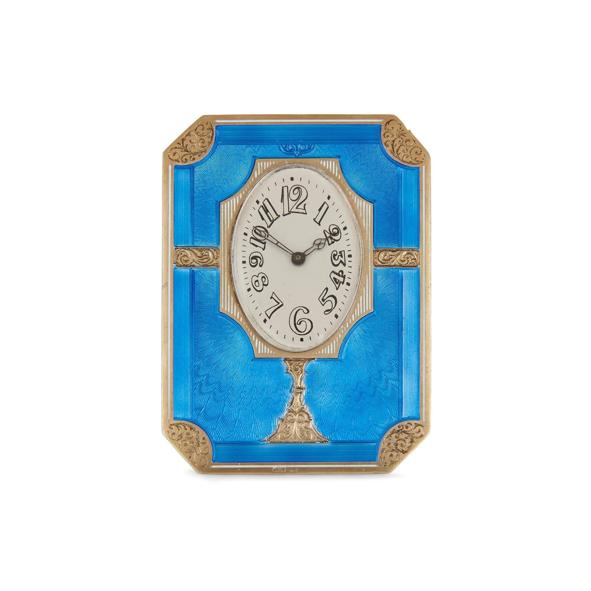 Antique Russian vermeil and enamel table clock
Russian, early 20th Century
Clock: Height 8cm, width 6cm, depth 7cm
Case: Height 4cm, width 8.5cm, depth 11cm

This exquisite Russian table clock is crafted of vermeil and turquoise guilloche enamel.