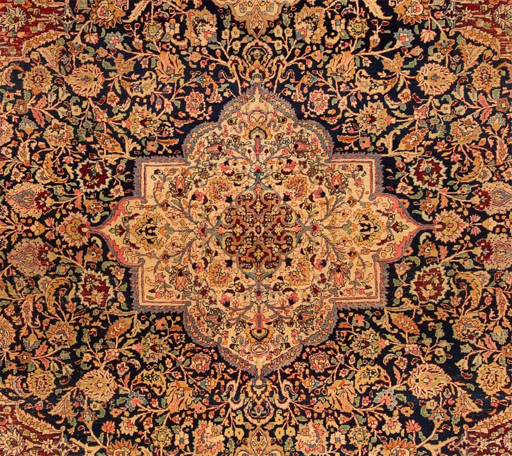 Hand-Knotted Antique Rust and Blue Persian Distress Floral Medallion Carpet For Sale