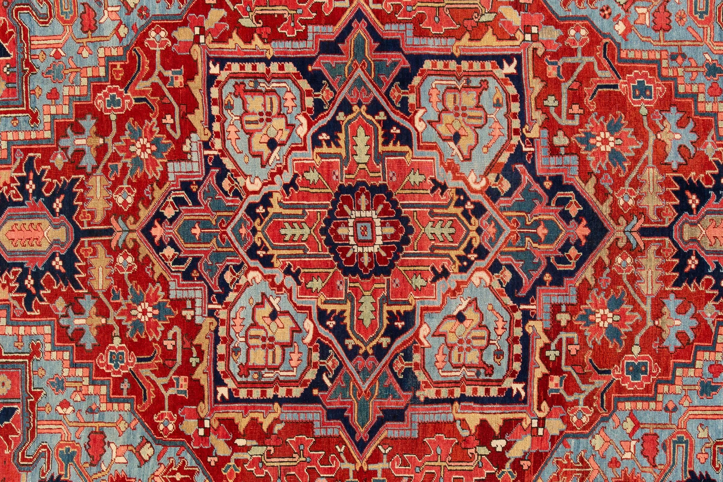 Early 20th Century Antique Persian Heriz Red Handmade Medallion Motif Wool Rug For Sale