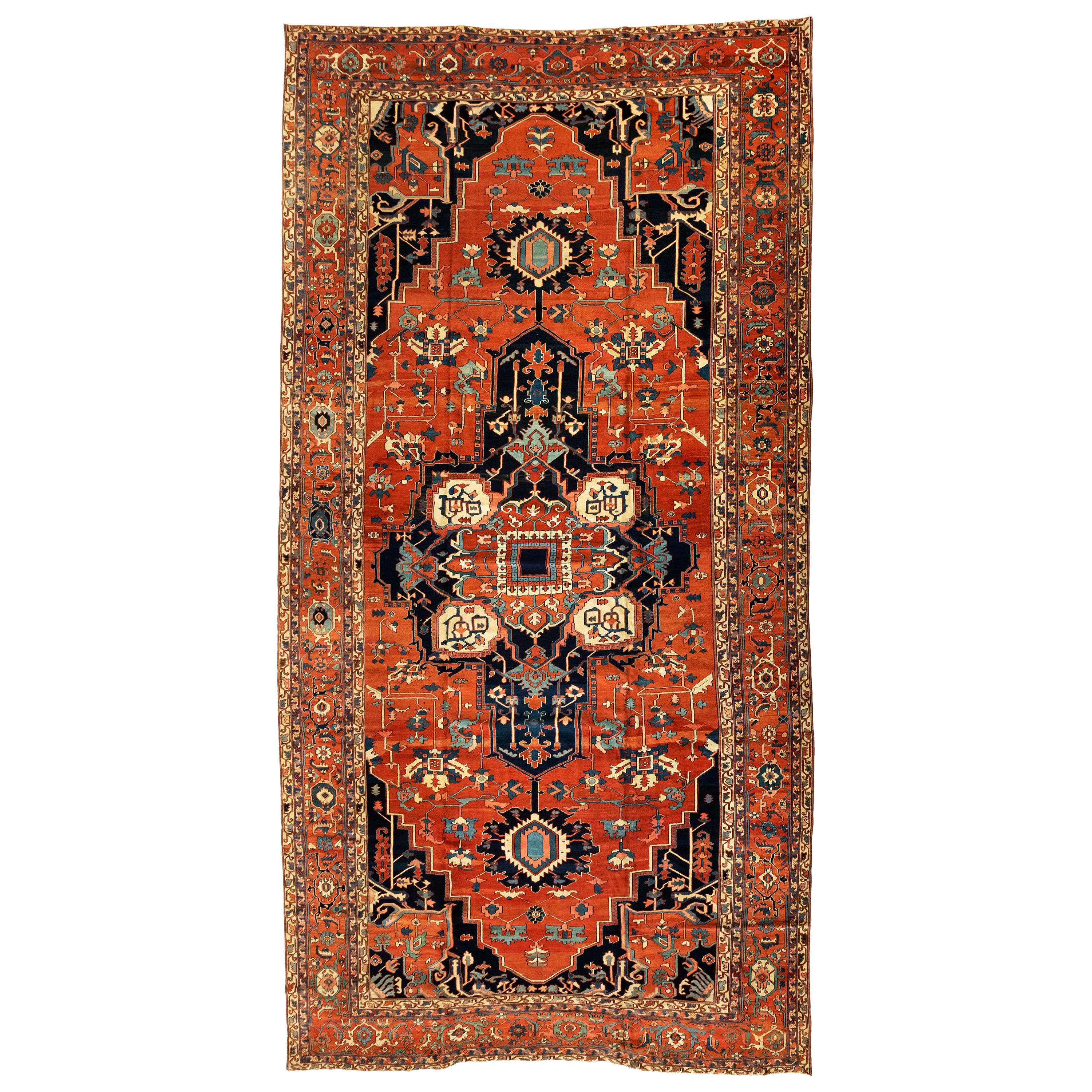 Antique Rust Ivory and Navy Blue Persian Serapi Area Rug, circa 1880-1900 For Sale