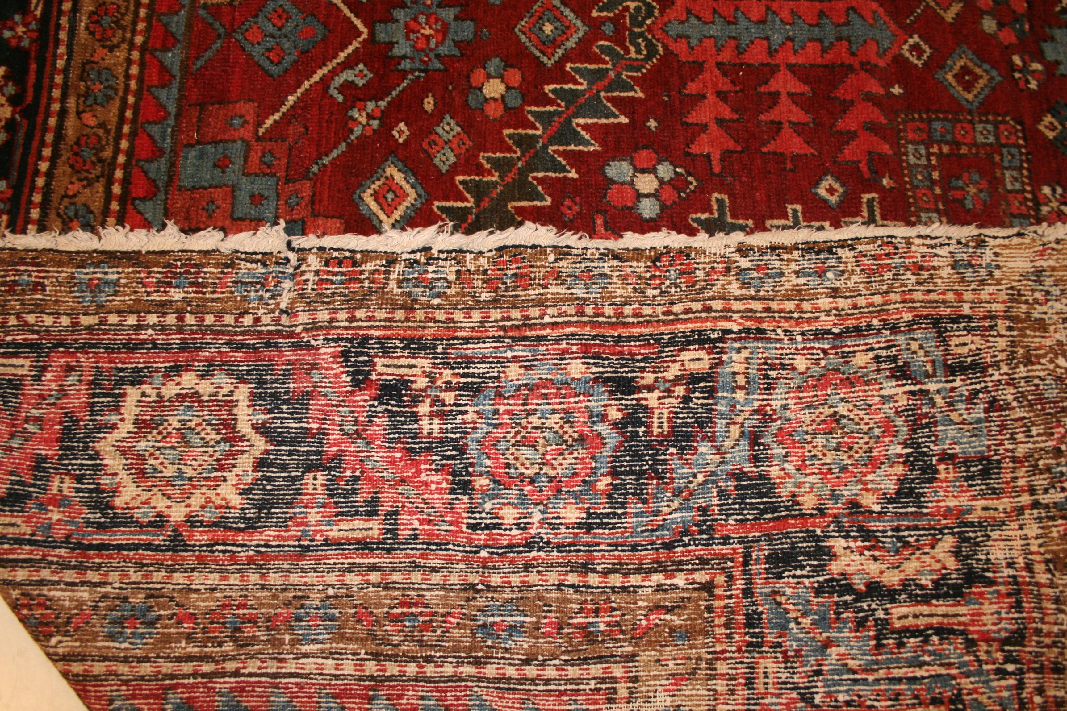 Hand-Knotted Antique Rust Red Heriz Rug with All-Over Design of Stylised Leafs and Palmettes For Sale