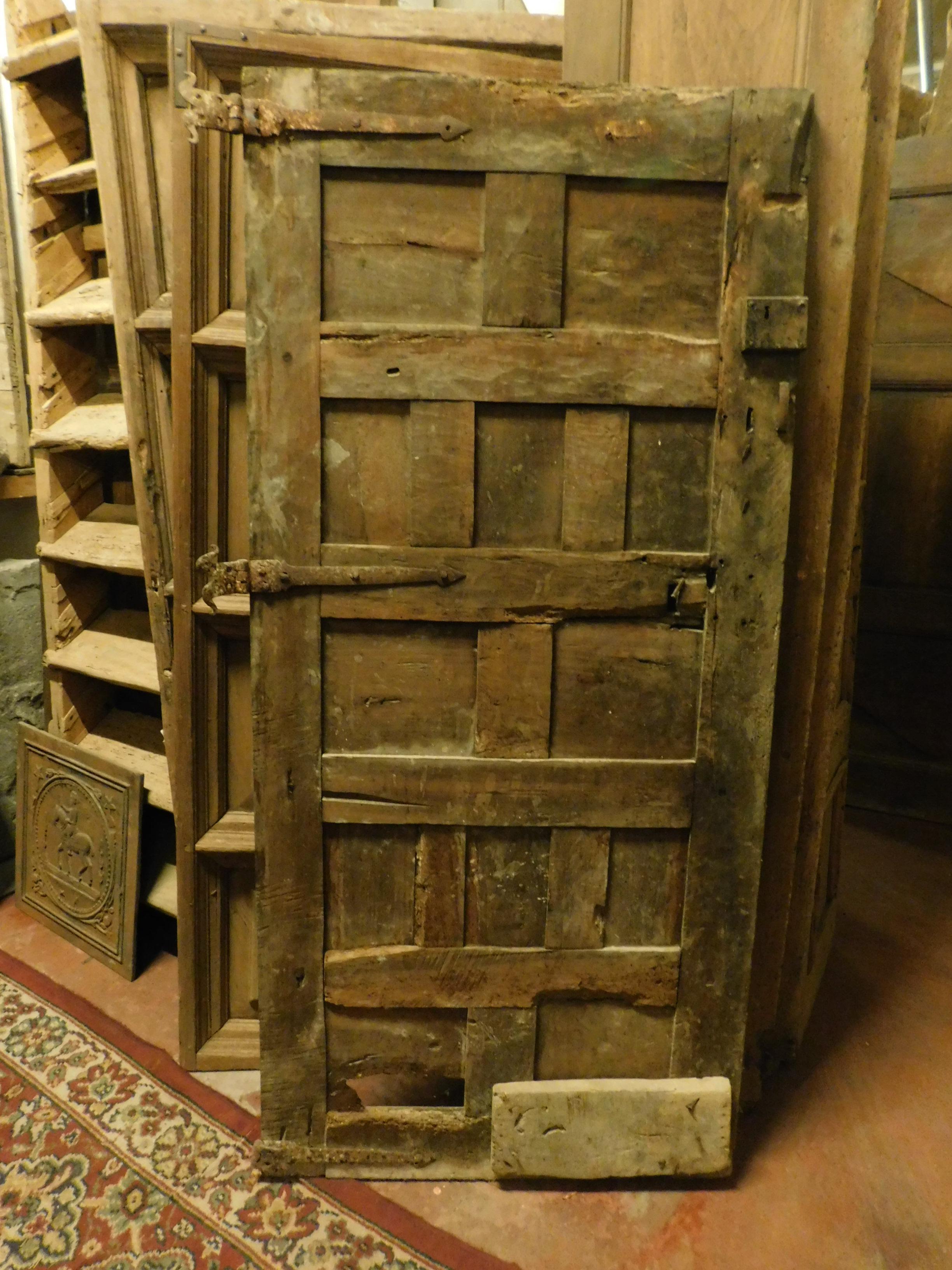 Hand-Carved Antique Rustic Black Wood Door with Panels, Spain, 1600 For Sale