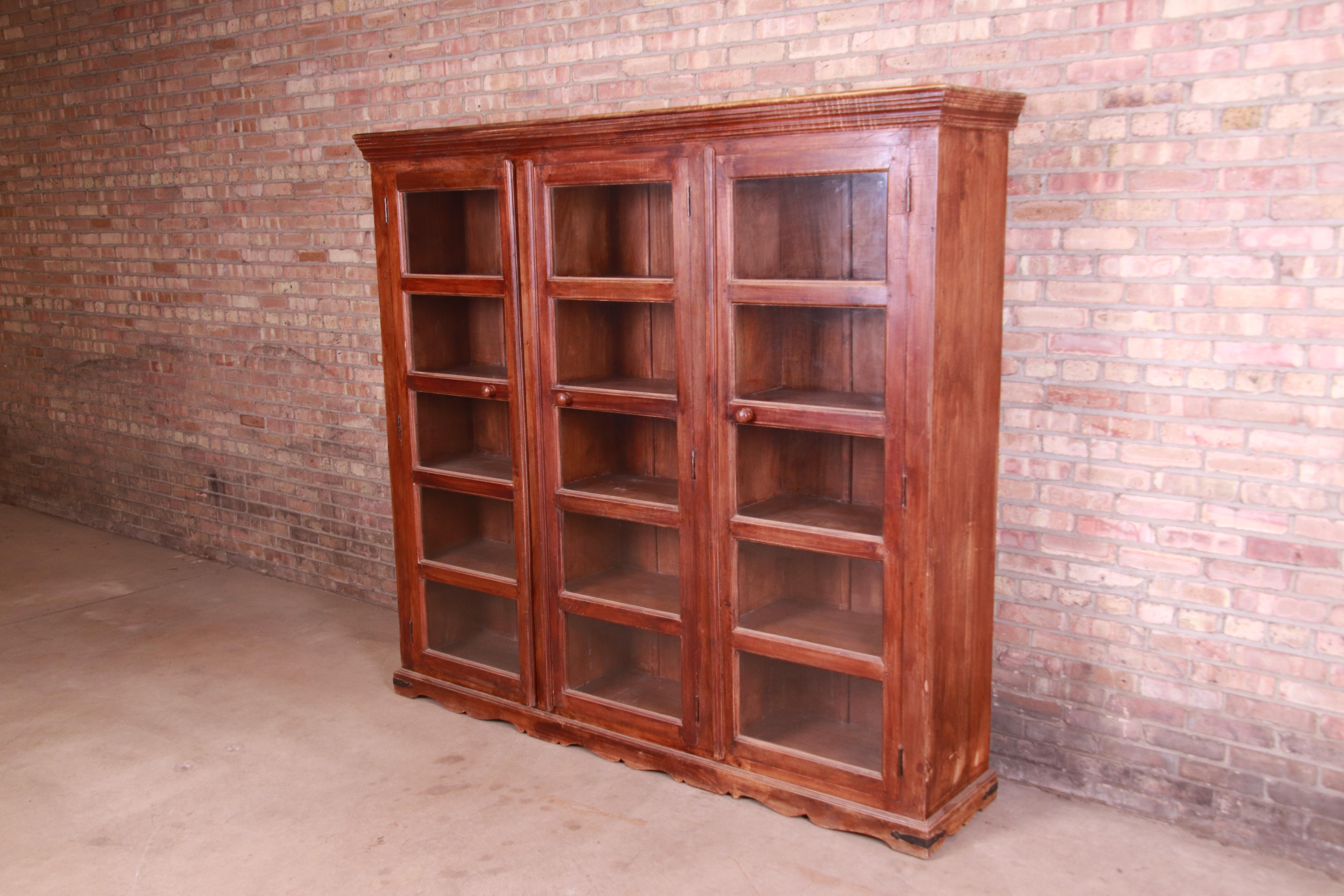 Antique Rustic Carved Walnut Triple Bookcase, Circa 1900 In Good Condition In South Bend, IN