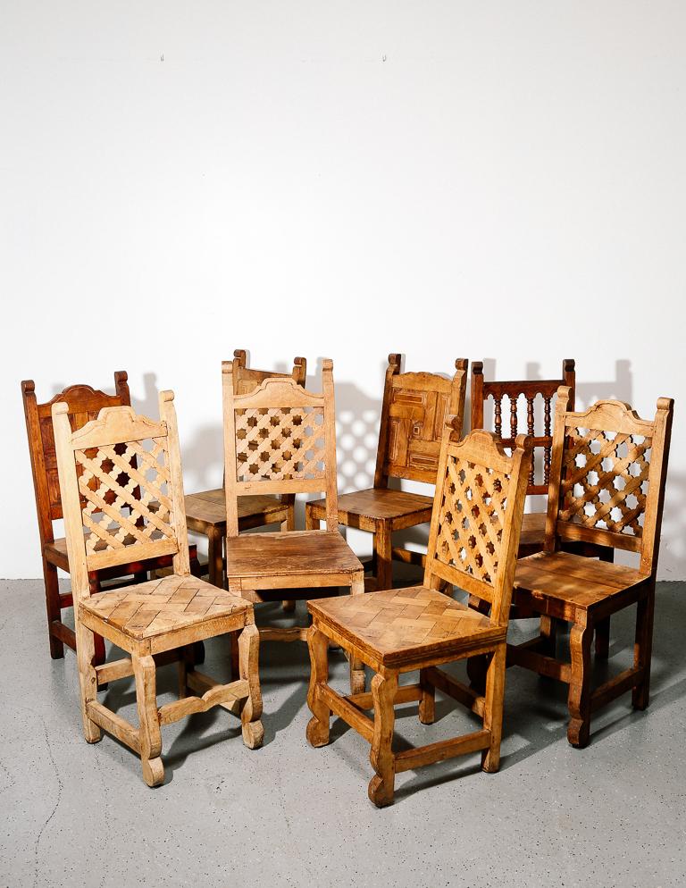 Antique rustic hand carved chairs in varying styles. 8 available.

Size: 18.5