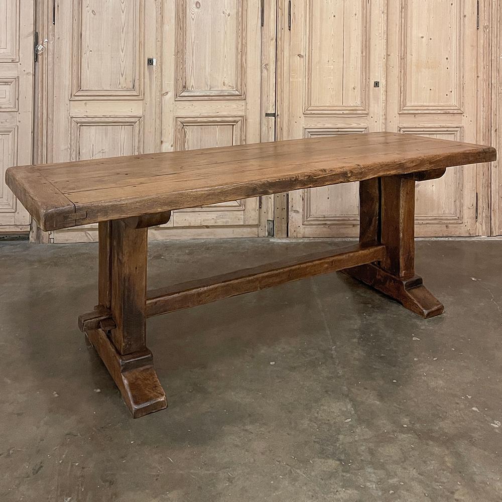 Antique Rustic Country French Trestle Dining Table is the perfect choice for any casual decor, and literally designed to last for centuries!  The top consists of about 3-inch thick planks so sturdy that a supporting apron is not necessary,
