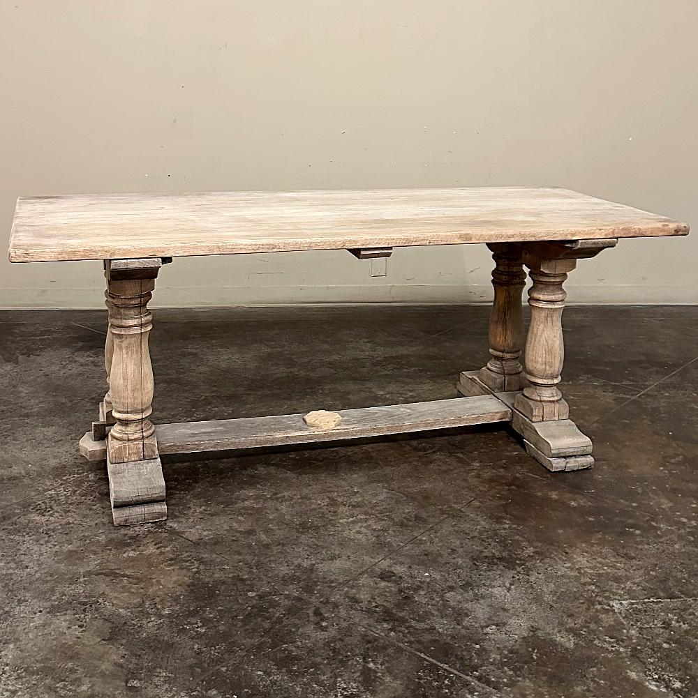 Antique Rustic Country French Trestle Table in Stripped Oak is ideal for the growing family or those who prefer a simpler, casual look combined with the utmost durability.  Hand-crafted from thick beams of tightly grained white oak, the top is