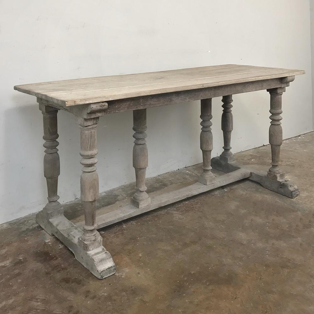 Antique Rustic Country French Whitewashed Sofa Table is of a classic design and features a colonnade resting on a classic 