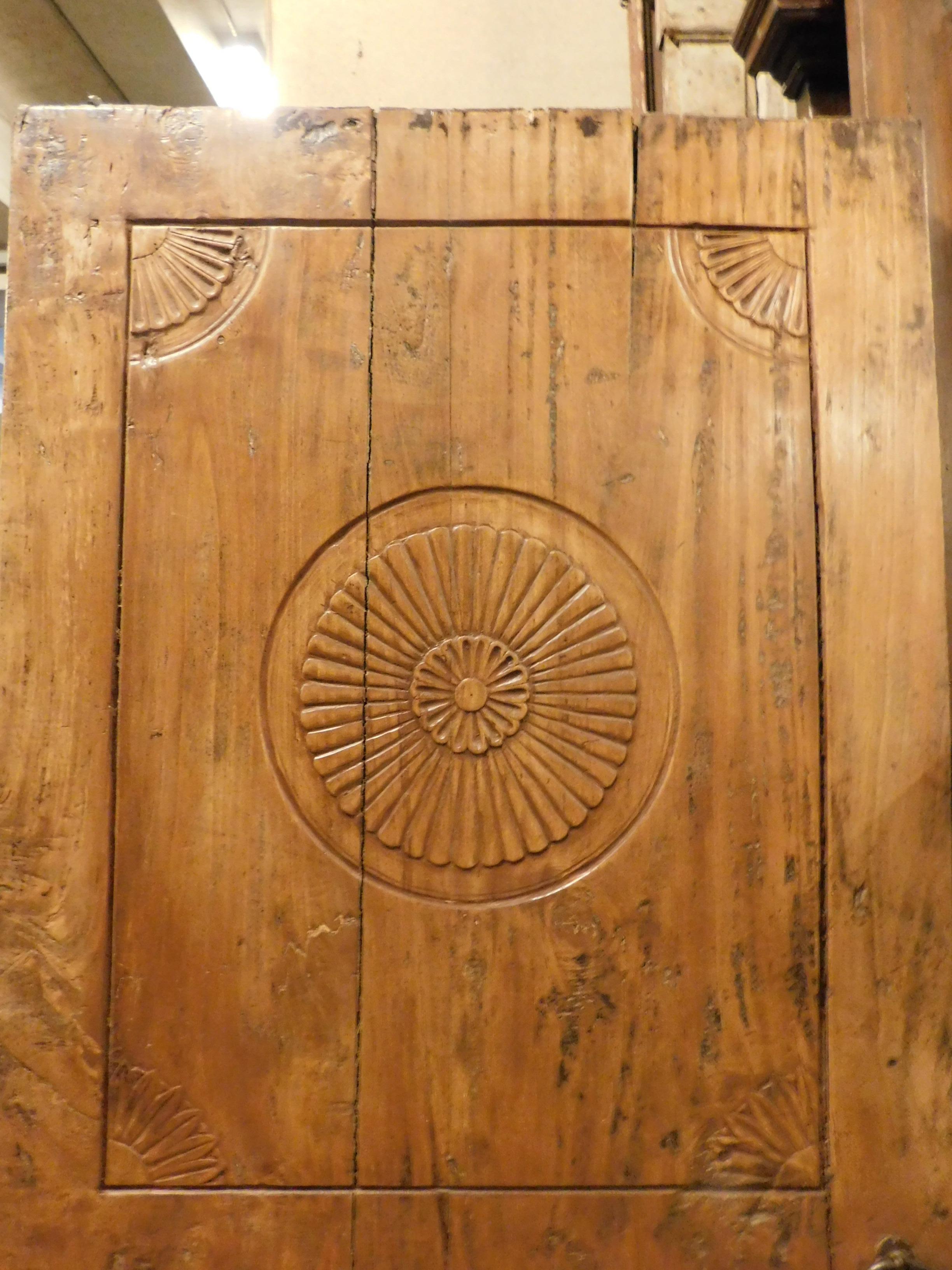 Hand-Carved Antique Rustic Door in Poplar with Carved Flower Decorations, 19th Century Italy