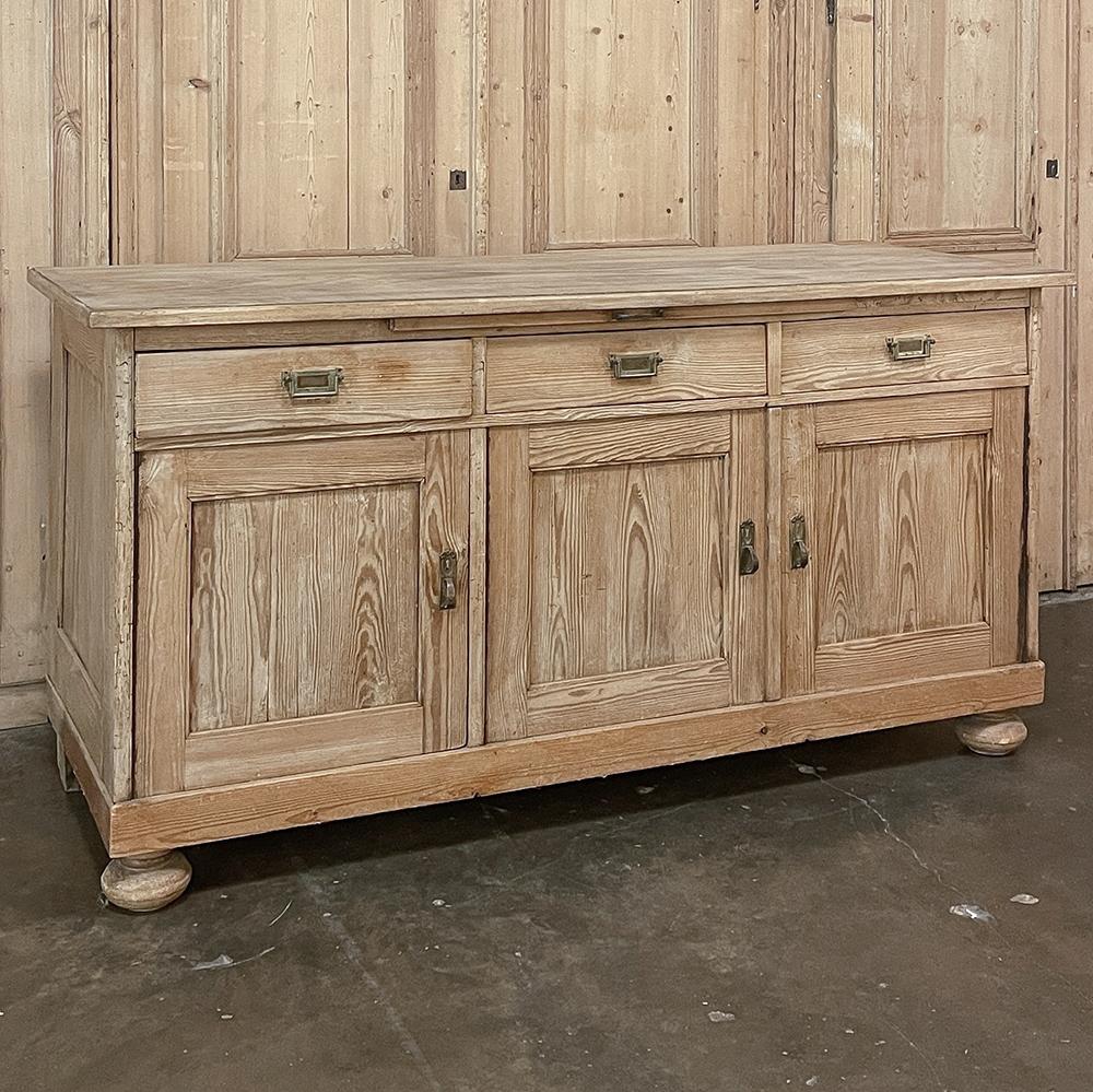 Antique Rustic French Buffet ~ Credenza in Stripped Pine is an unusual combination of low surface height, voluminous storage, and tailored architecture that makes it perfect for home or office!  Just a hair under three feet tall, it works behind the