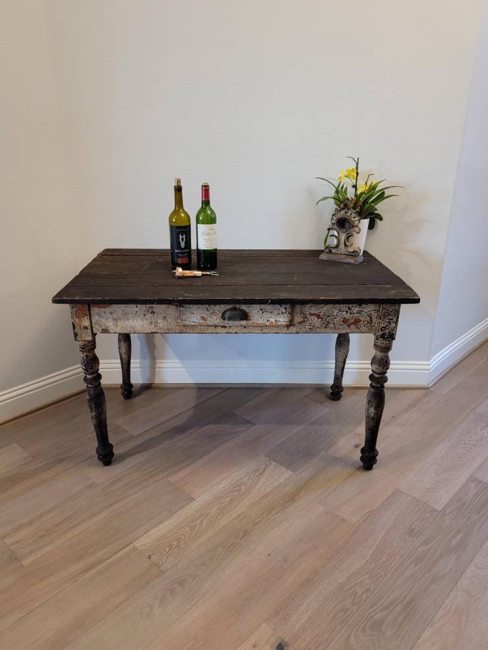Patina Perfection!! A rustic French farmhouse work table from the 19th century. 

Featuring hand-crafted pegged solid wood construction, featuring an overhanging rectangular ebonized five plank boarded top, over a simple apron with single drawer,
