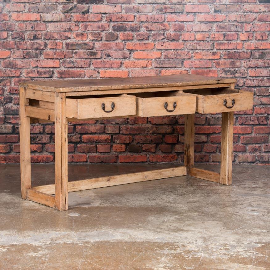 Simplicity with a touch of rustic charm sums up this light, hard wood French console table. The distressed top has been left natural and the base lightly waxed giving this table a time worn yet enduring feel. Please take a moment to enlarge the