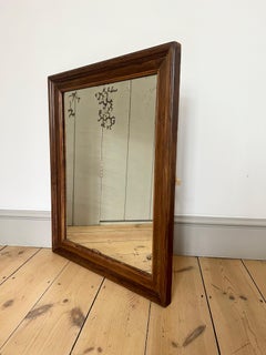 Antique French rustique wall mirror with original foxed glass, early 20th century