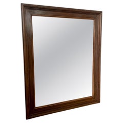 Antique French rustique wall mirror with original foxed glass, early 20th century