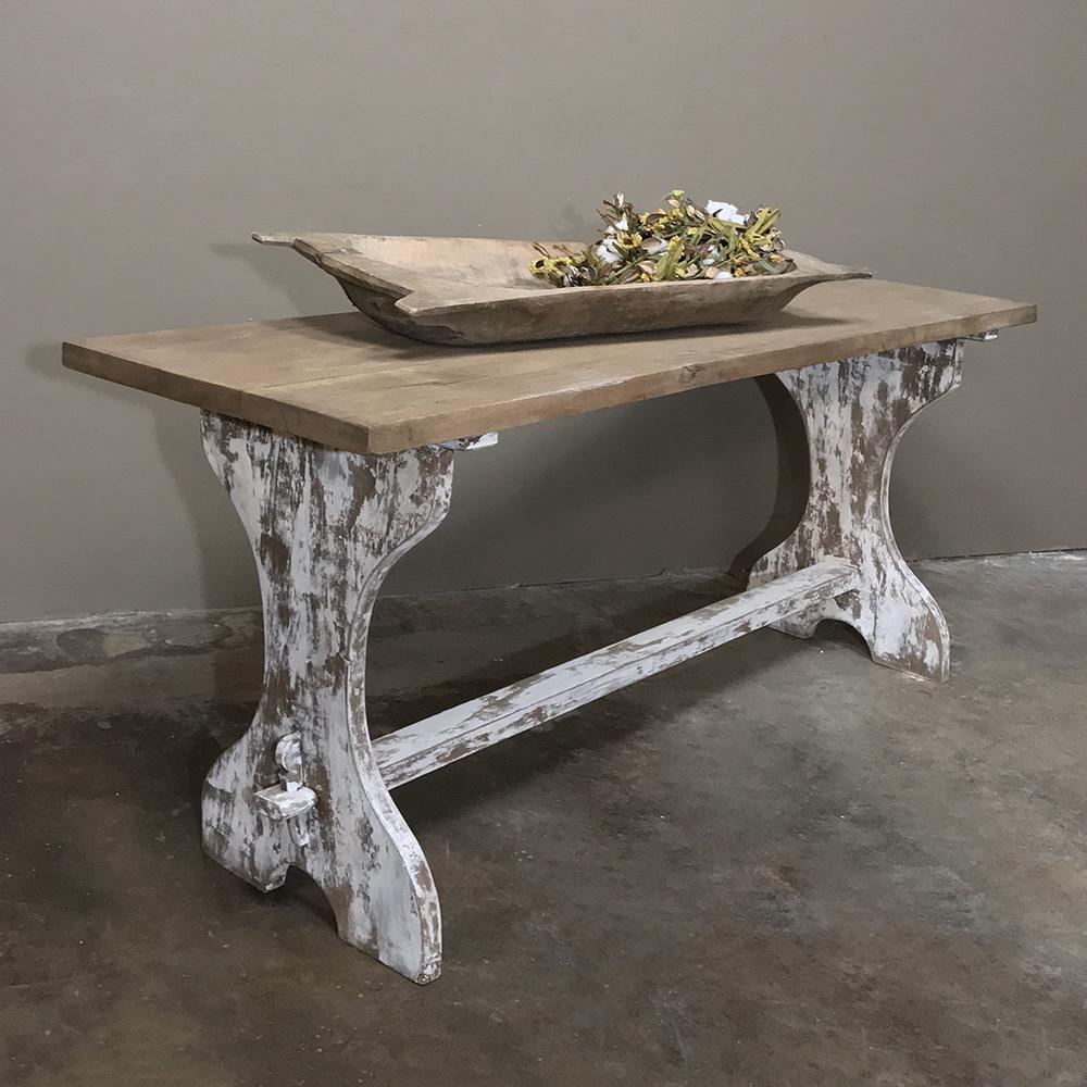 Antique rustic painted Country French trestle table features a narrow width making it a great choice for a rustic sofa table! Handcrafted from solid oak timbers to last for centuries, it features sturdy side supports connected with a lower trestle