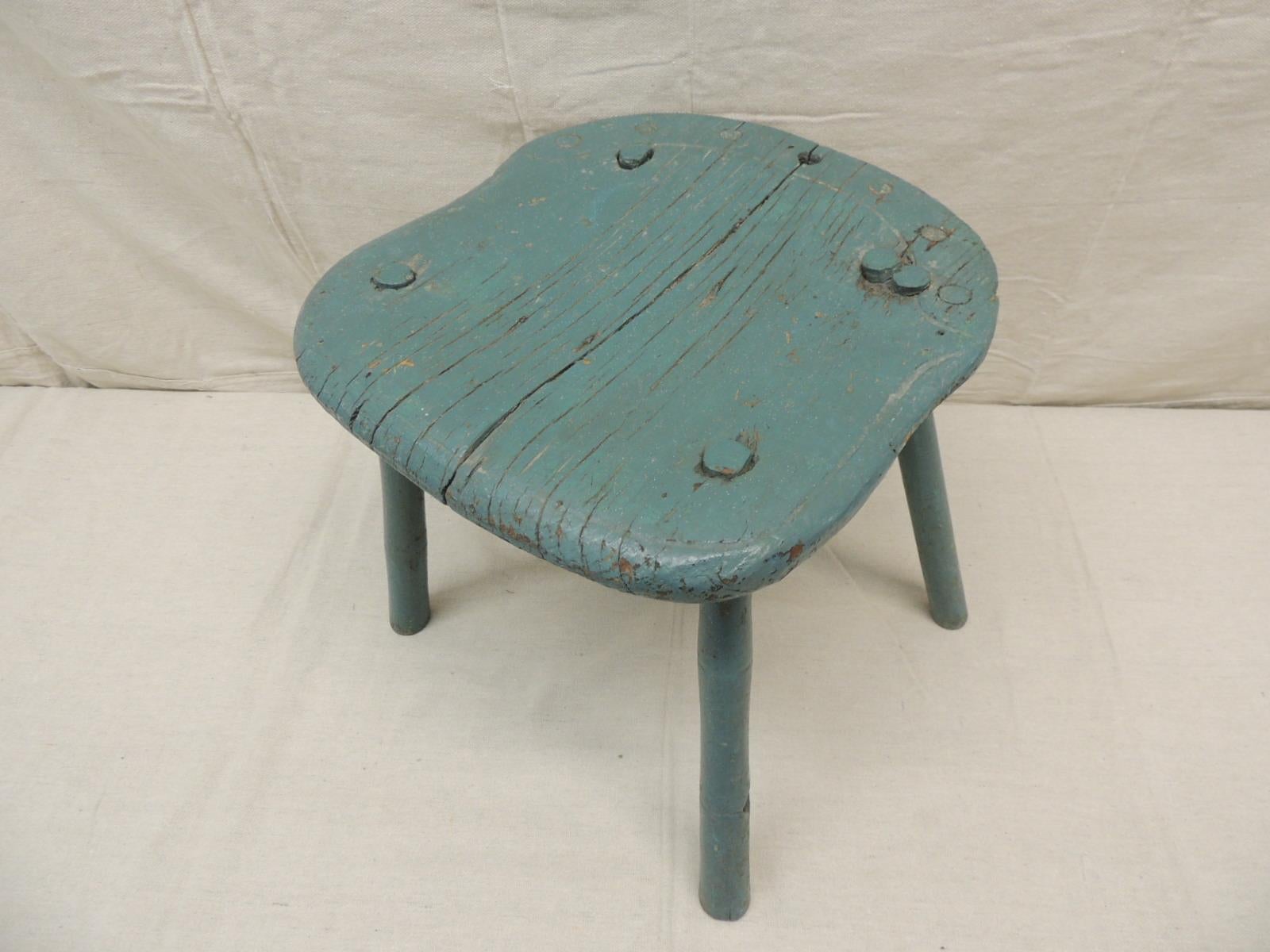 Antique Rustic painted stool
Farmers stand.
Green glossy paint stool with peg round legs
Size: 12” x 13” x 11” H.
 
