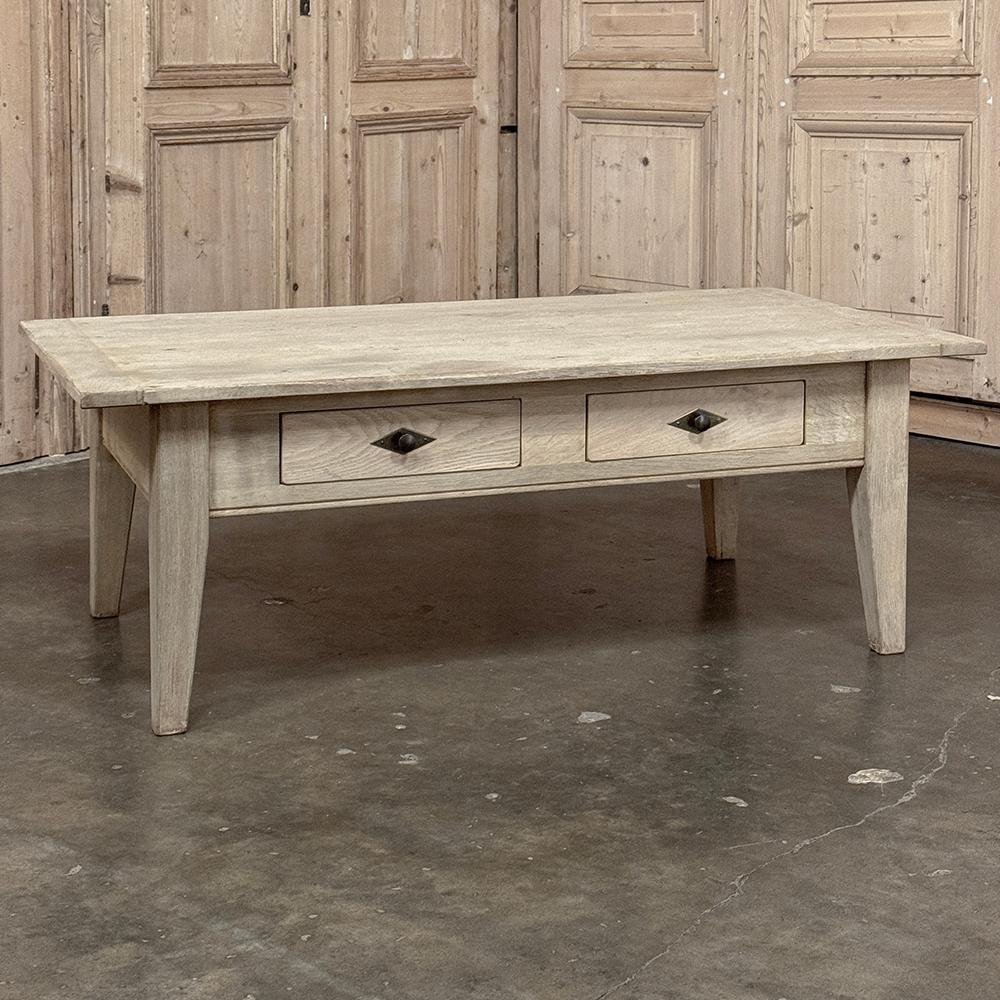 Antique Rustic Stripped Oak Coffee Table combines a straightforward design with wonderful hand-selected wood to create a table your family will enjoy for generations!  Solid oak plank top and sturdy beams serving as legs are connected with solid