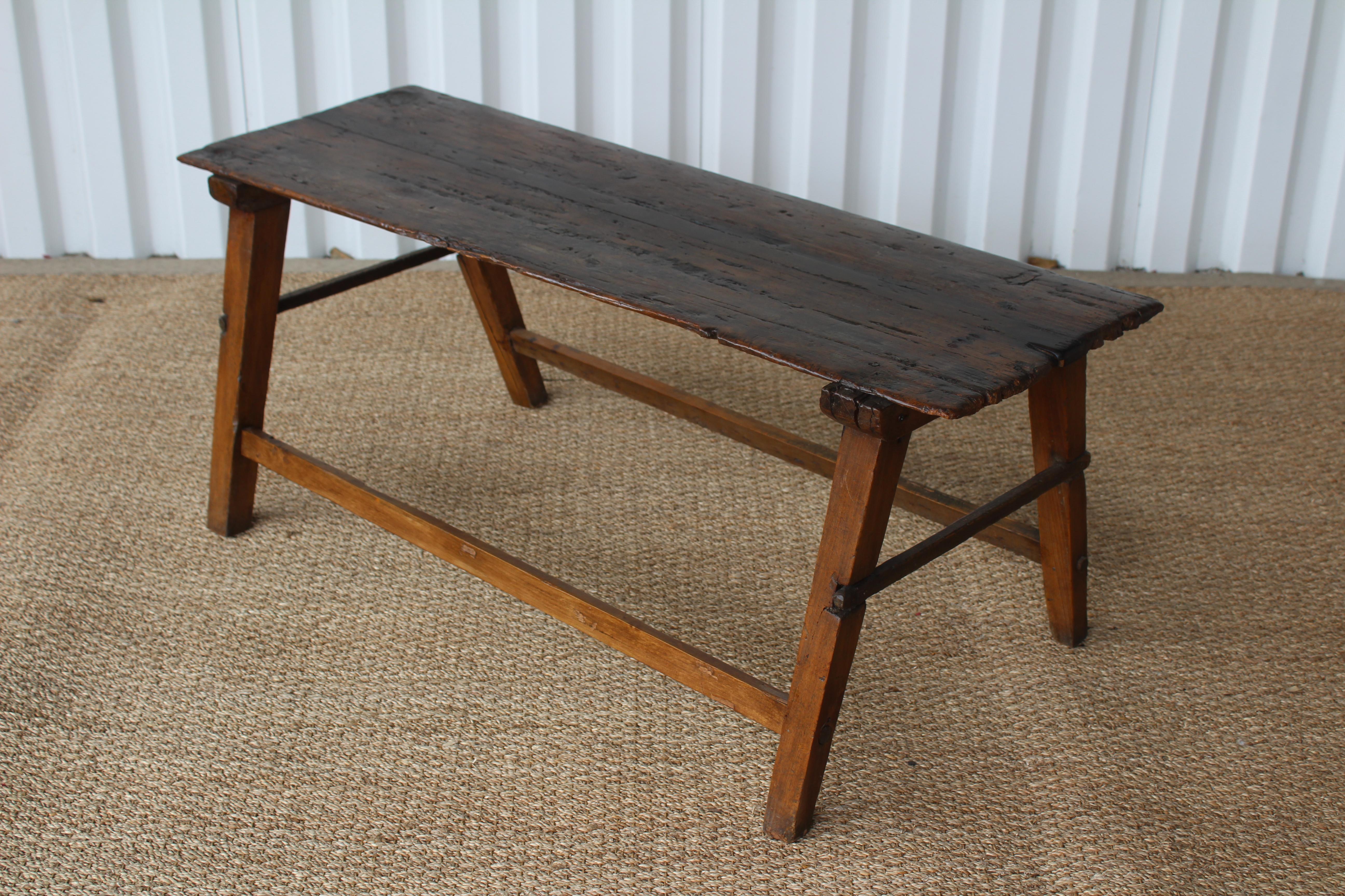 Antique rustic wood table. Age appropriate wear with minor losses.