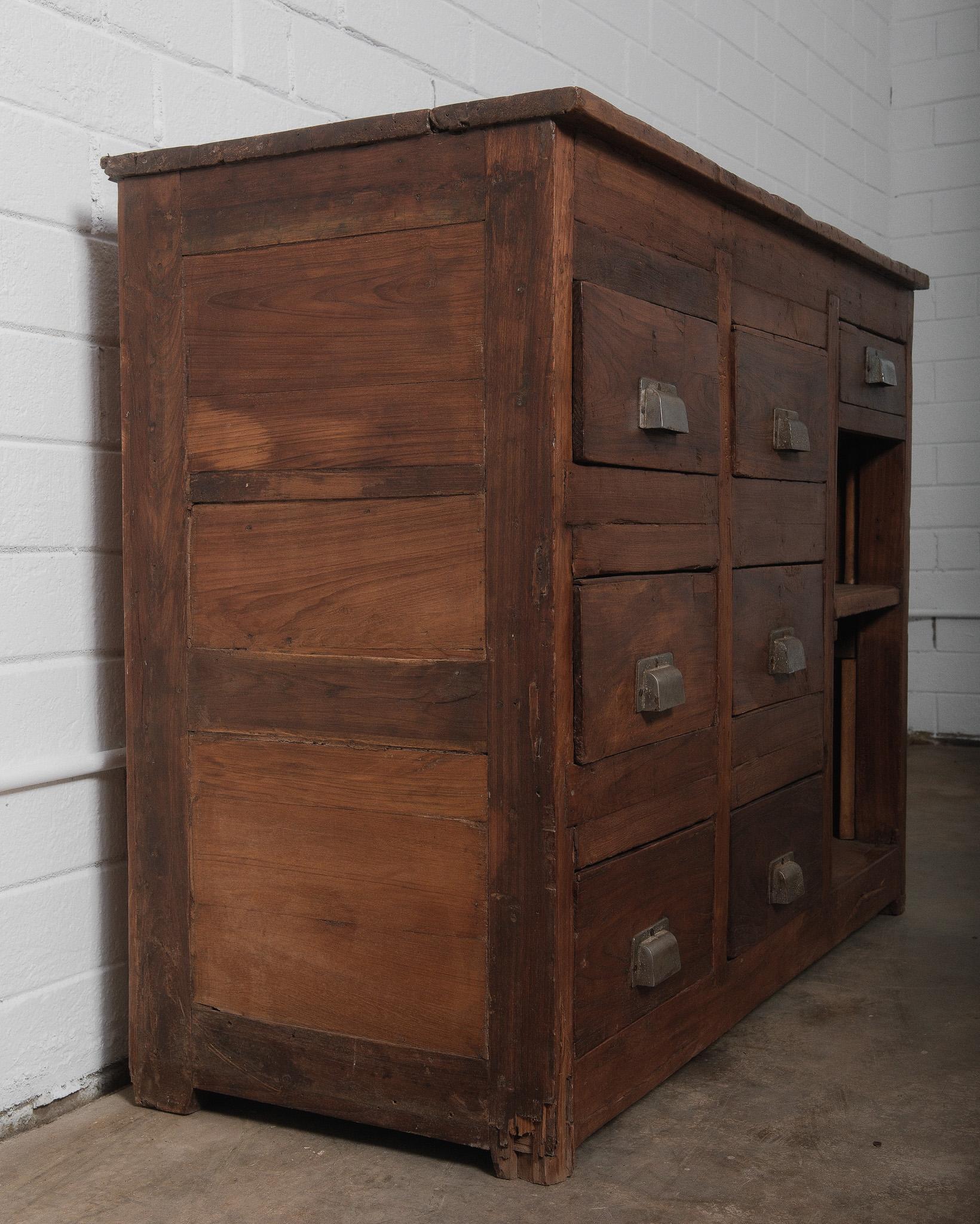 20th Century Antique Rustic Wooden Apothecary Cabinet with Metal Handles For Sale