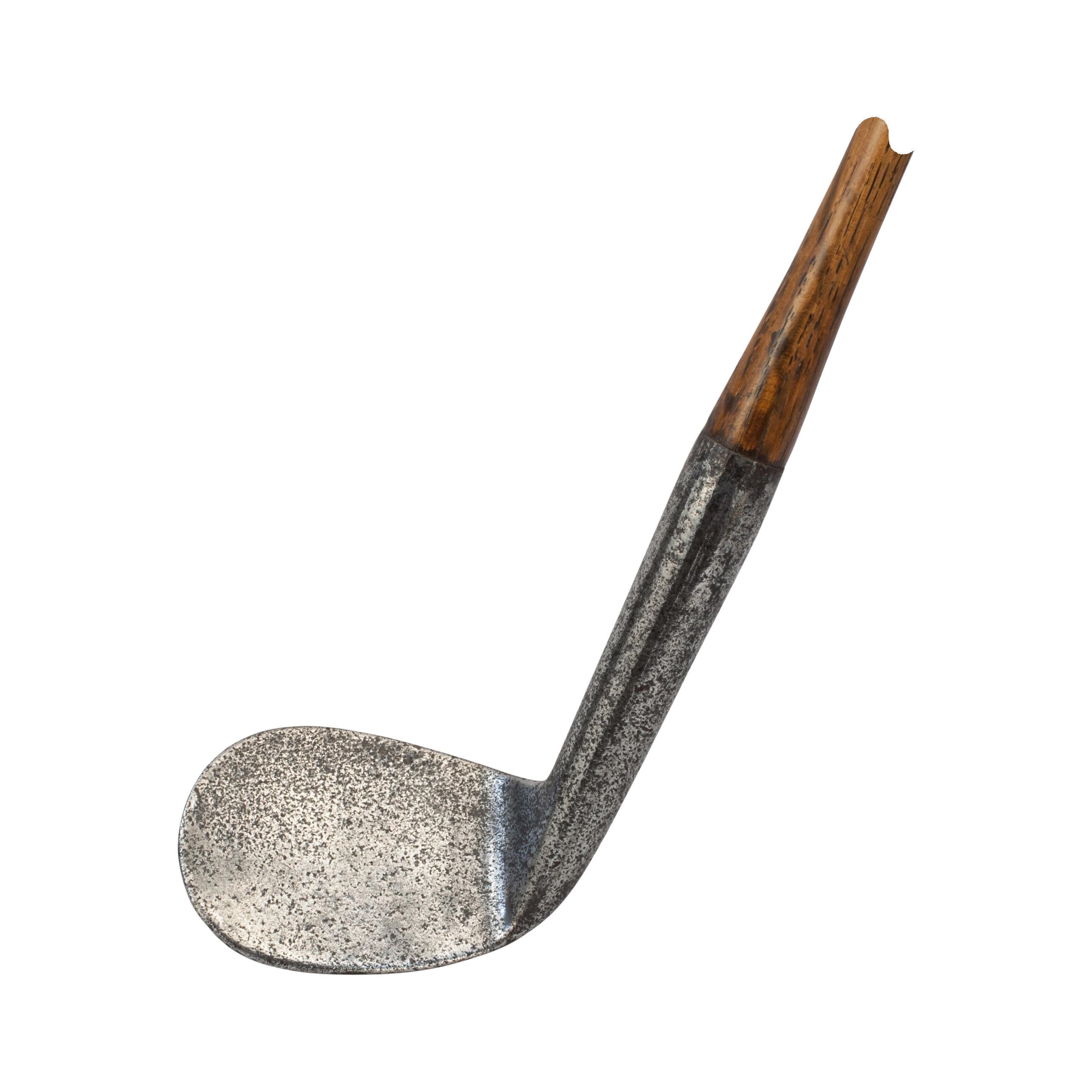 Hickory Shafted Rut Iron.
A good quality smooth faced rut iron, also known as a rut niblick, rutter or track iron. Rut irons were commonly used to hit the ball from cart tracks and deep ruts etc. Young Tom Morris was known to hit his rut iron from