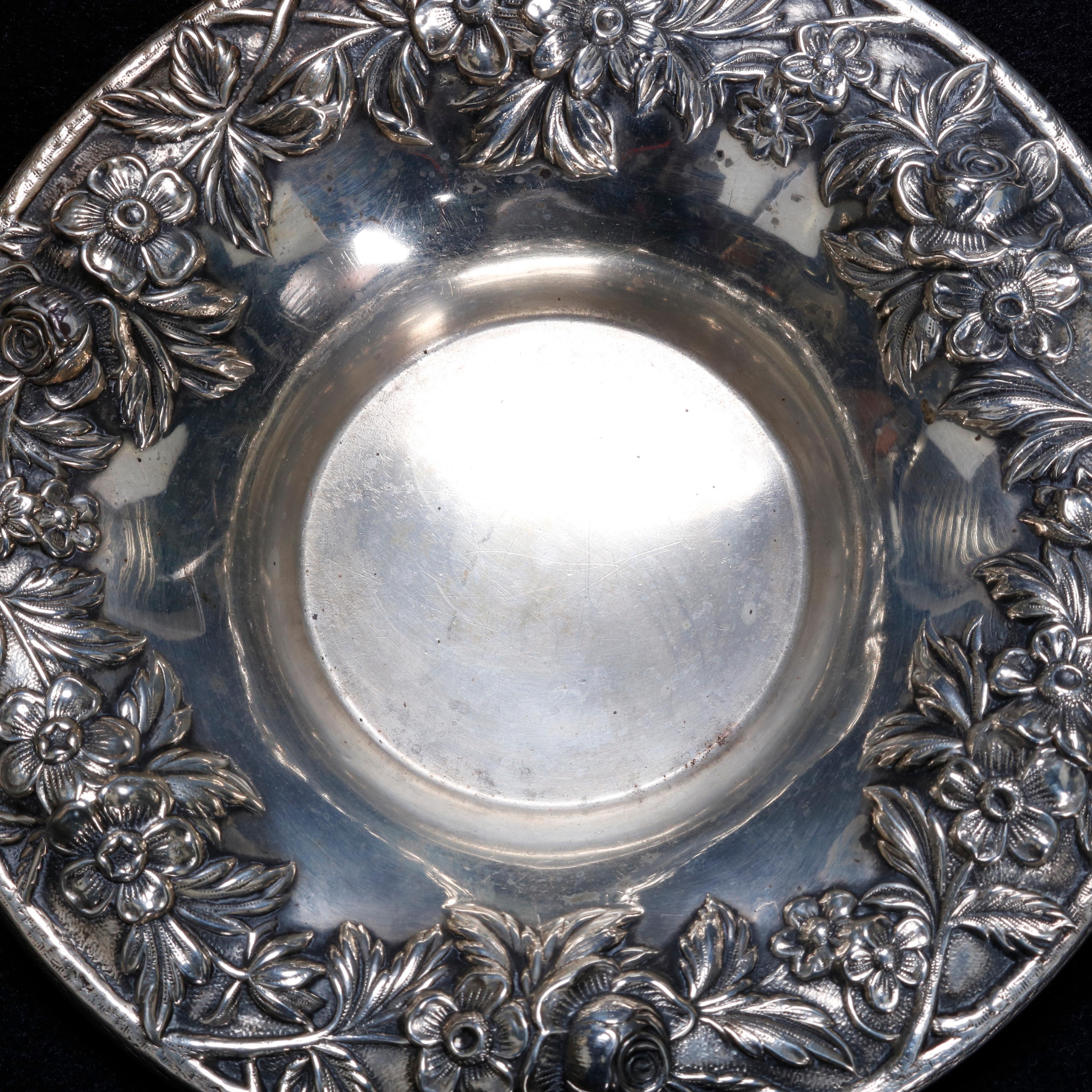 An antique S. Kirk & Sons nut bowl offers floral repousse rim, en verso stamped as photographed, circa 1890

Measures: 1.25