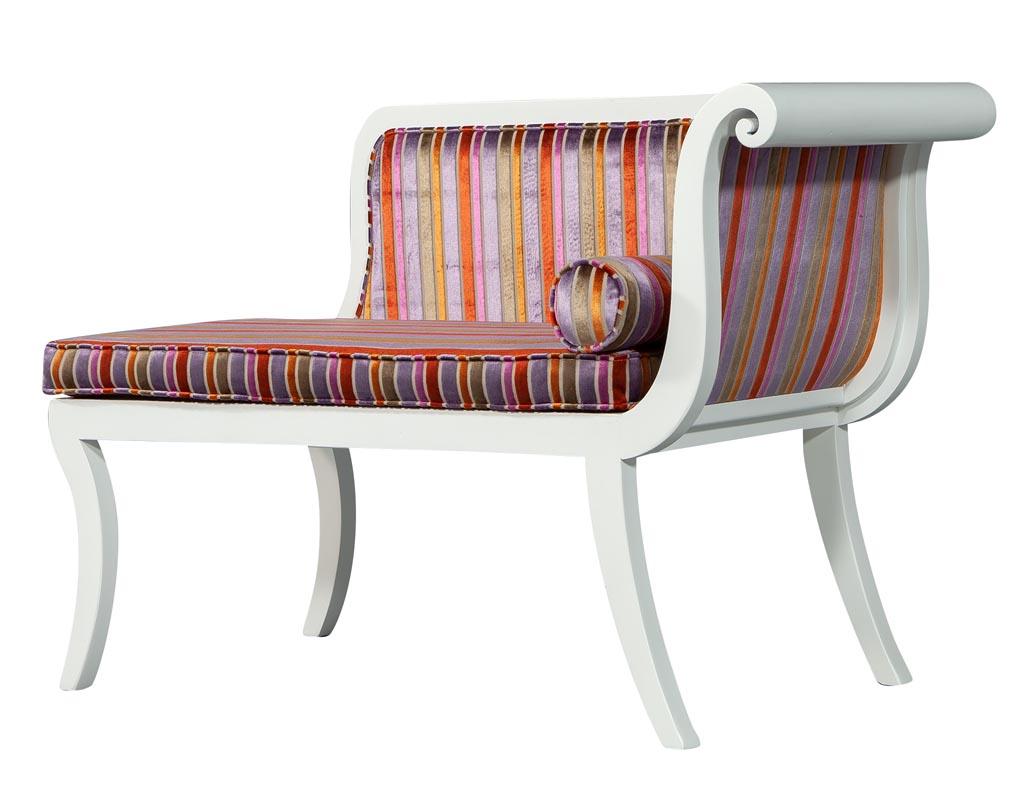 Antique 1940's Sabre Leg Bedroom Chaise Lounge. Vintage Chaise, refinished in a designer white lacquer and upholstered in a colorful designer stripe fabric. 