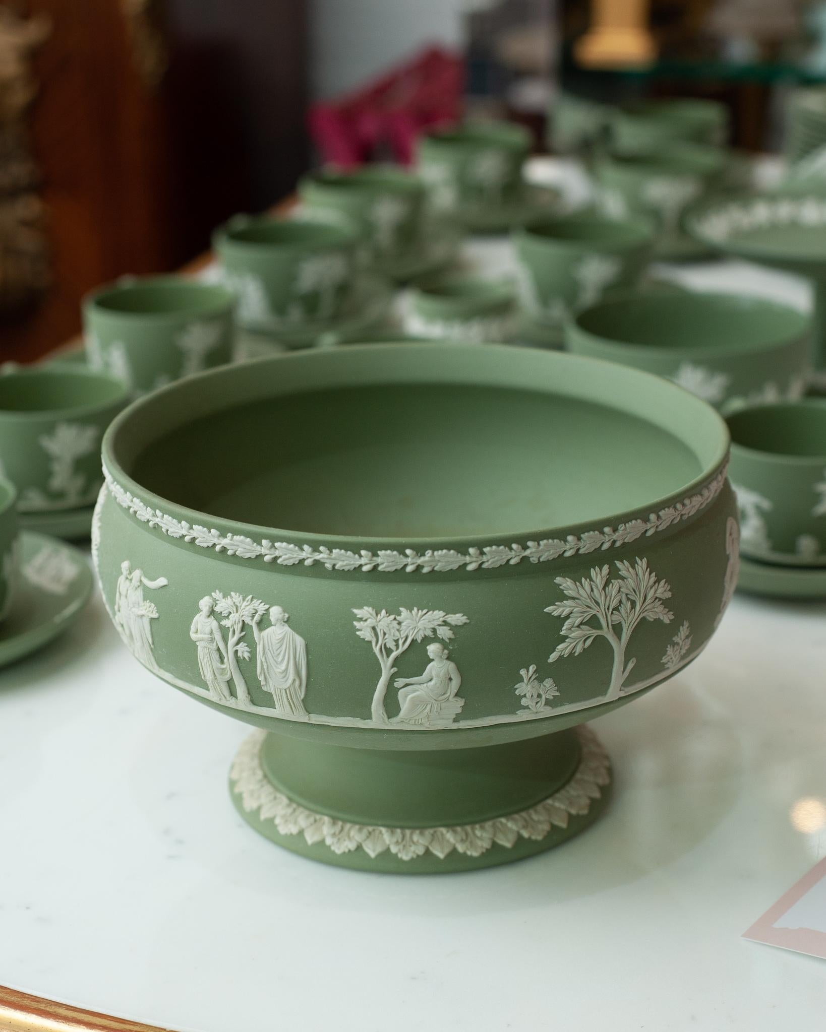 A stunning large antique Wedgwood sage green jasperware footed bowl with white overlay.