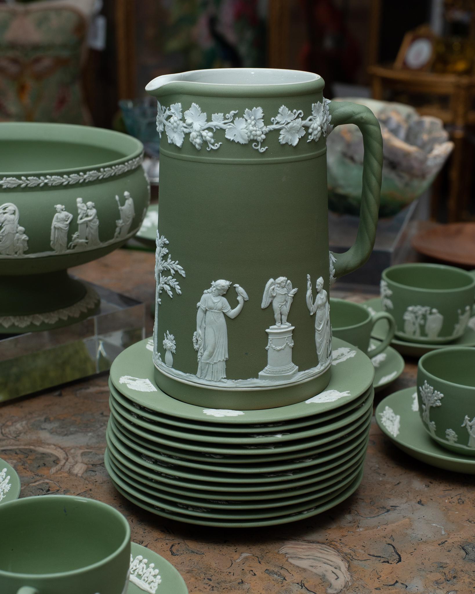 A stunning antique Wedgwood Sage green Jasperware large pitcher with white overlay, circa 1912.