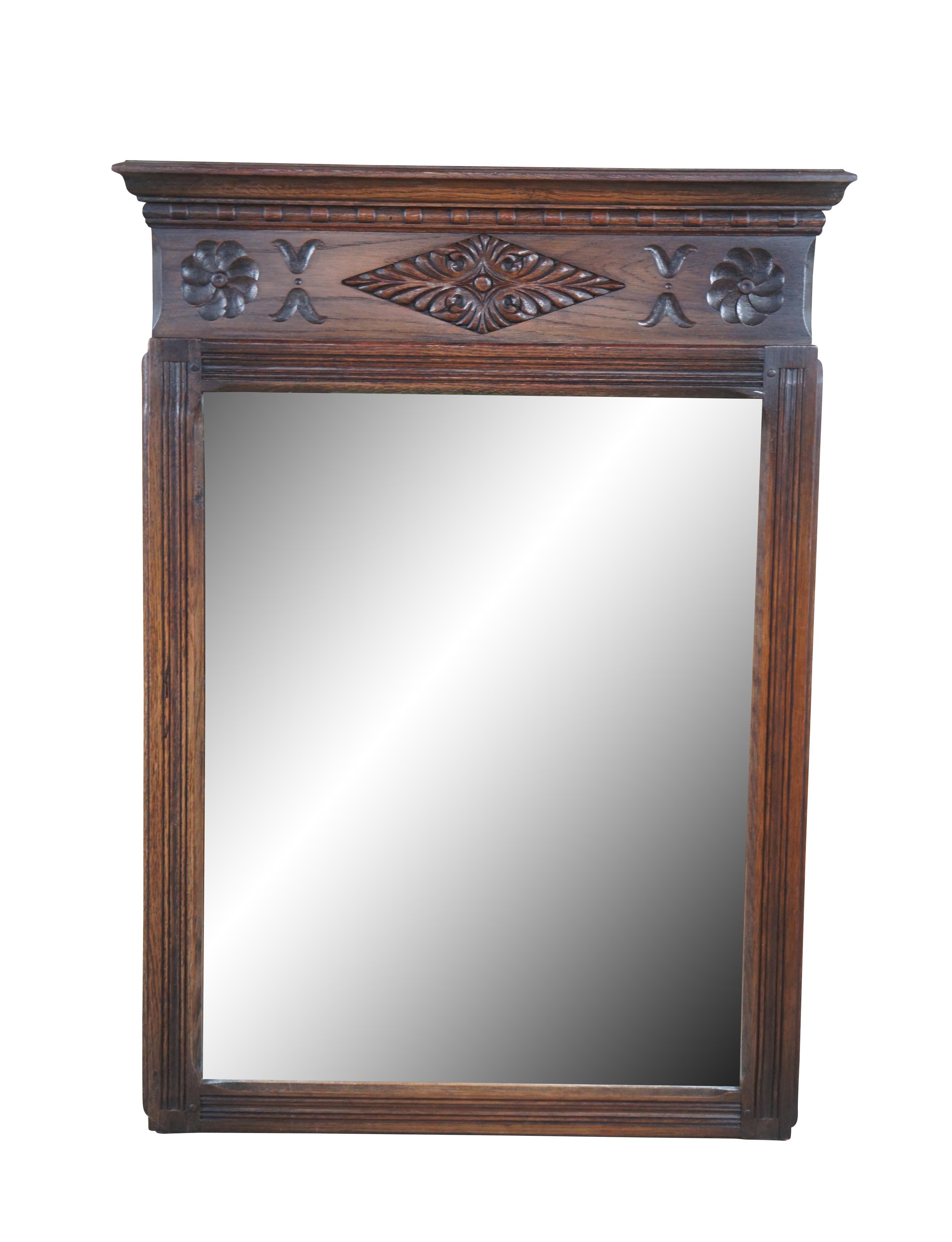 Spanish Revival mirror by Saginaw Furniture, circa late 1930s to early 40s. Made from oak with diamond pattern acanthus carved accents flanked by pinwheels.

Saginaw Furniture Shops, Inc. was founded in 1923 (incorporated January 19, 1928) by Lionel