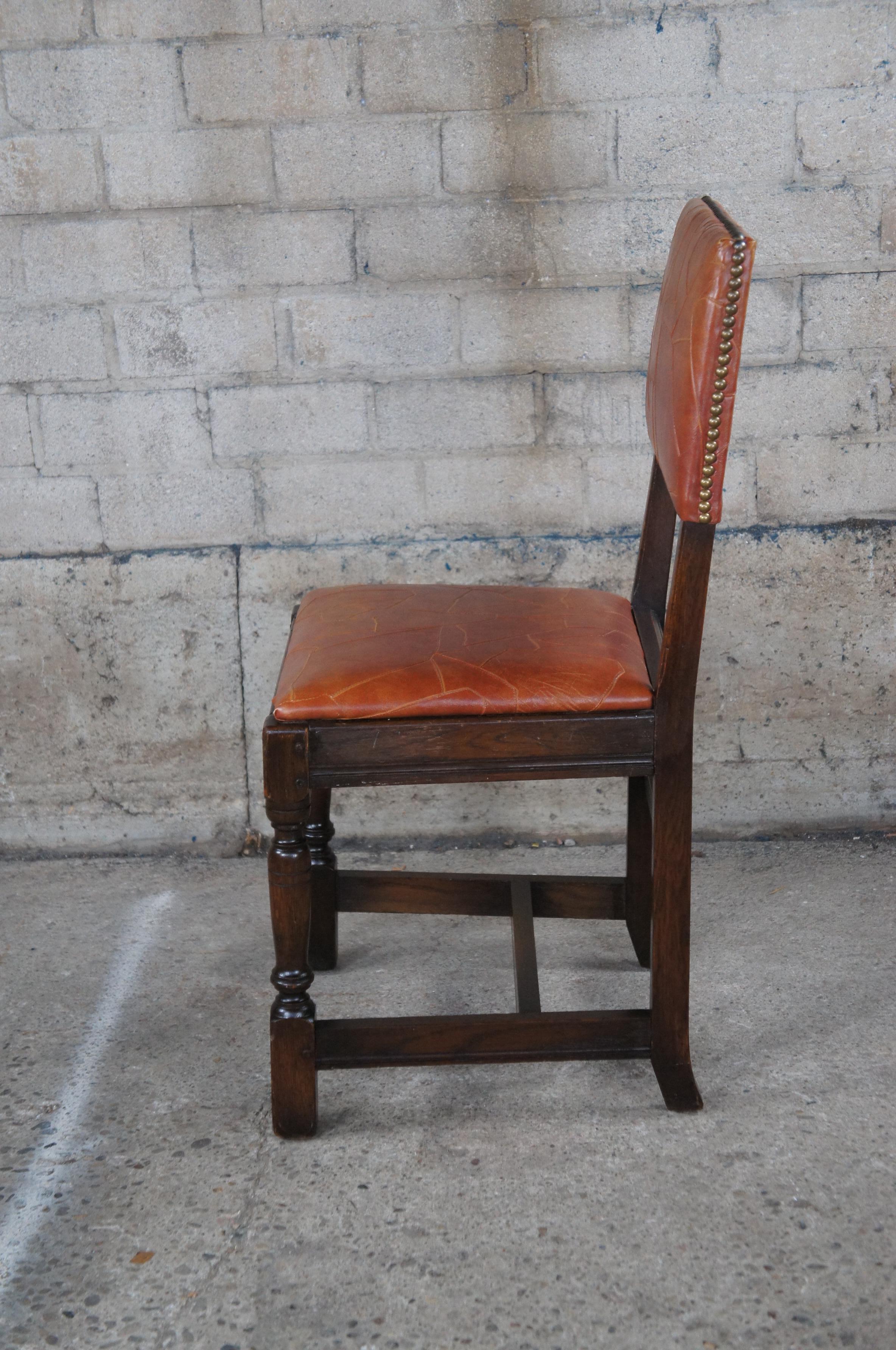 Mid-20th Century Antique Saginaw Furniture Jacobean Spanish Revival Orange Leather Oak Side Chair For Sale