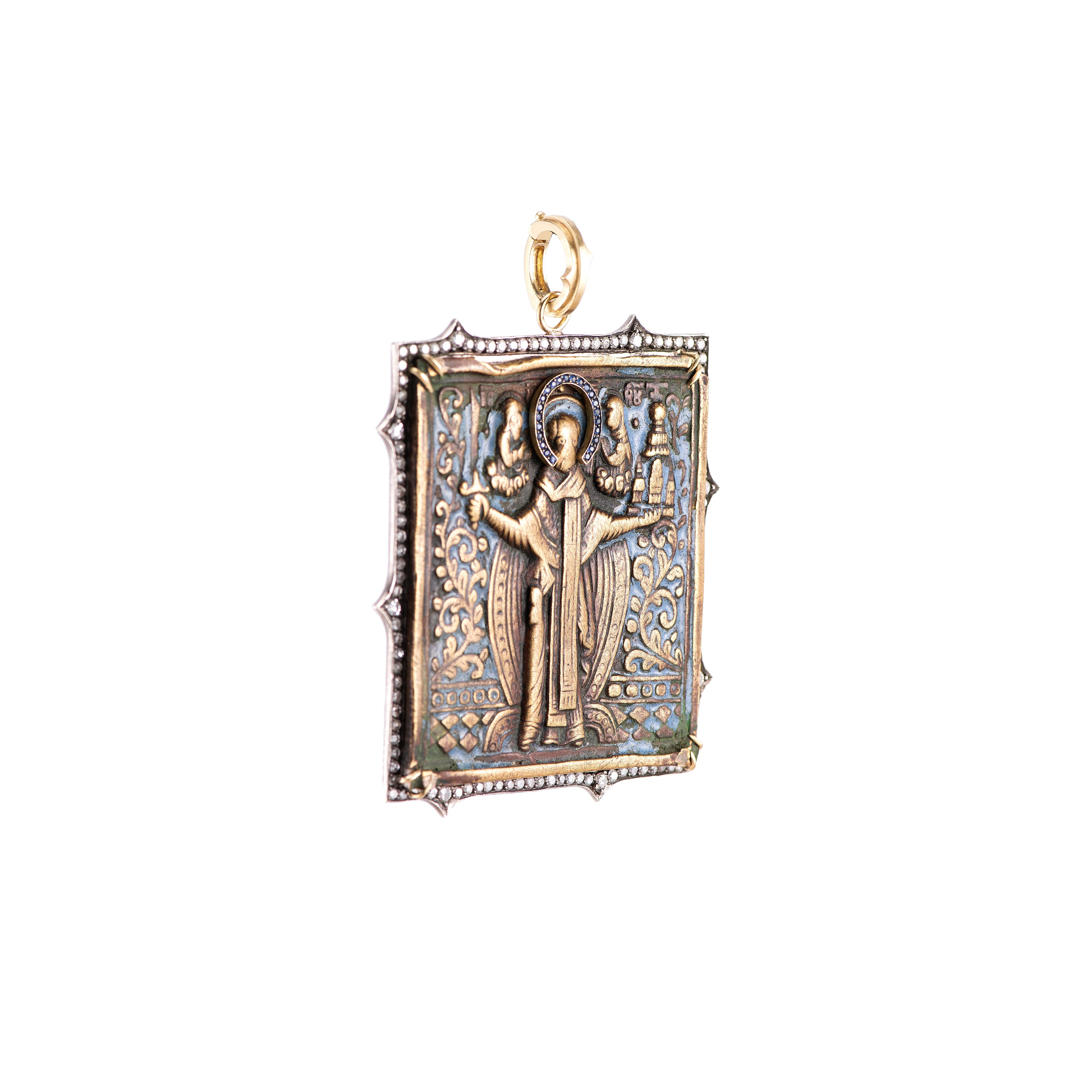 19th Century Russian Travel Icons were given to faithful travelers as a mascot of protection and good luck. This particular icon depicts Saint Anthony with artist-added sapphire halo and a diamond-bordered frame with Sylva's signature thorn motifs.