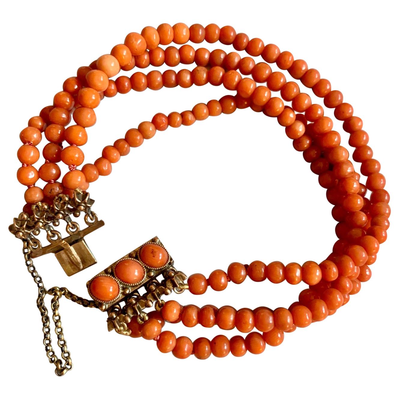 Antique Salmon Coral 4-Strand Bead Bracelet with 14 Karat Yellow Gold Clasp