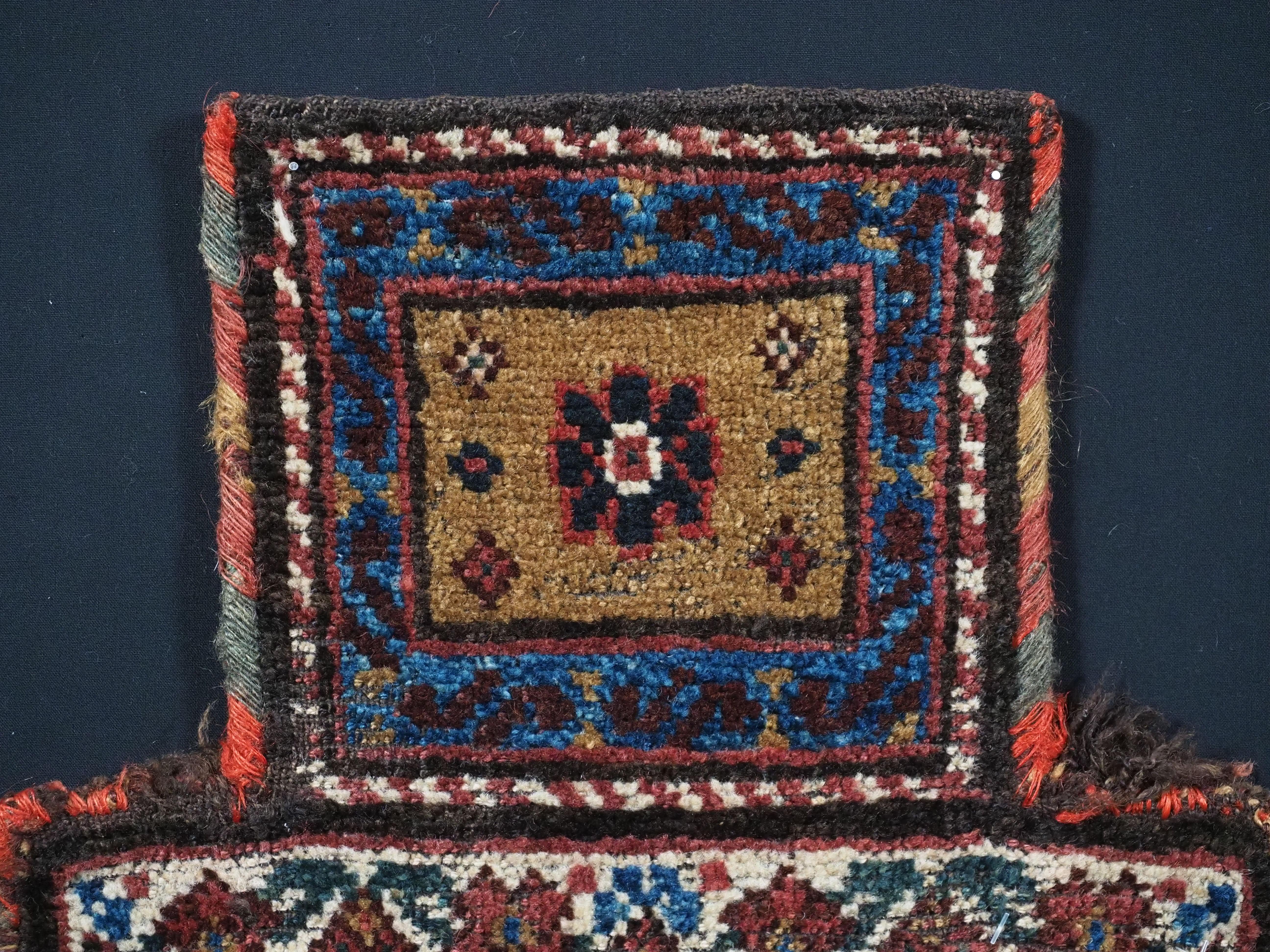 
Size: 1ft 5in x 1ft 2in (44 x 36cm).

Antique salt-bag by the nomads of the Varamin region of central Persia, south of Tehran.

Circa 1900.

This is a good example of Varamin salt-bag in piled weave with a panelled floral design. The salt-bag has