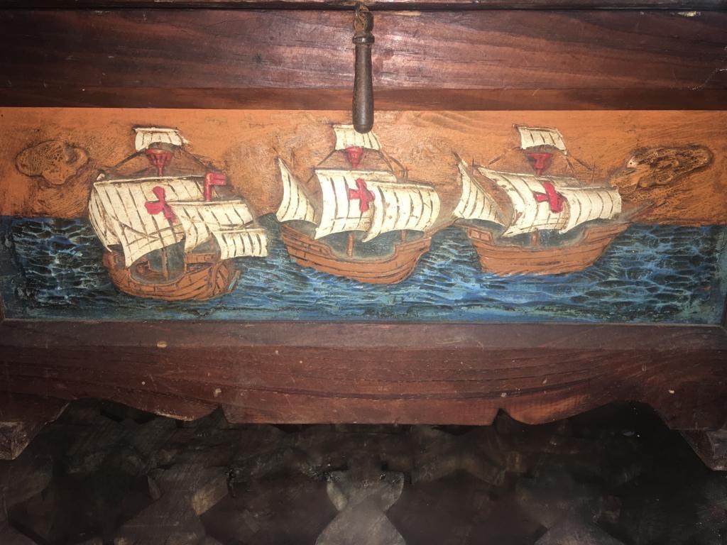 This handcrafted antique chest is quite a find. Hand carved, the Spanish Galleon are perfectly painted and detailed, down to the waves of the water and red Crow's nest. The chest is made of Tamarisk, also known as salt cedar, which is naturally pest