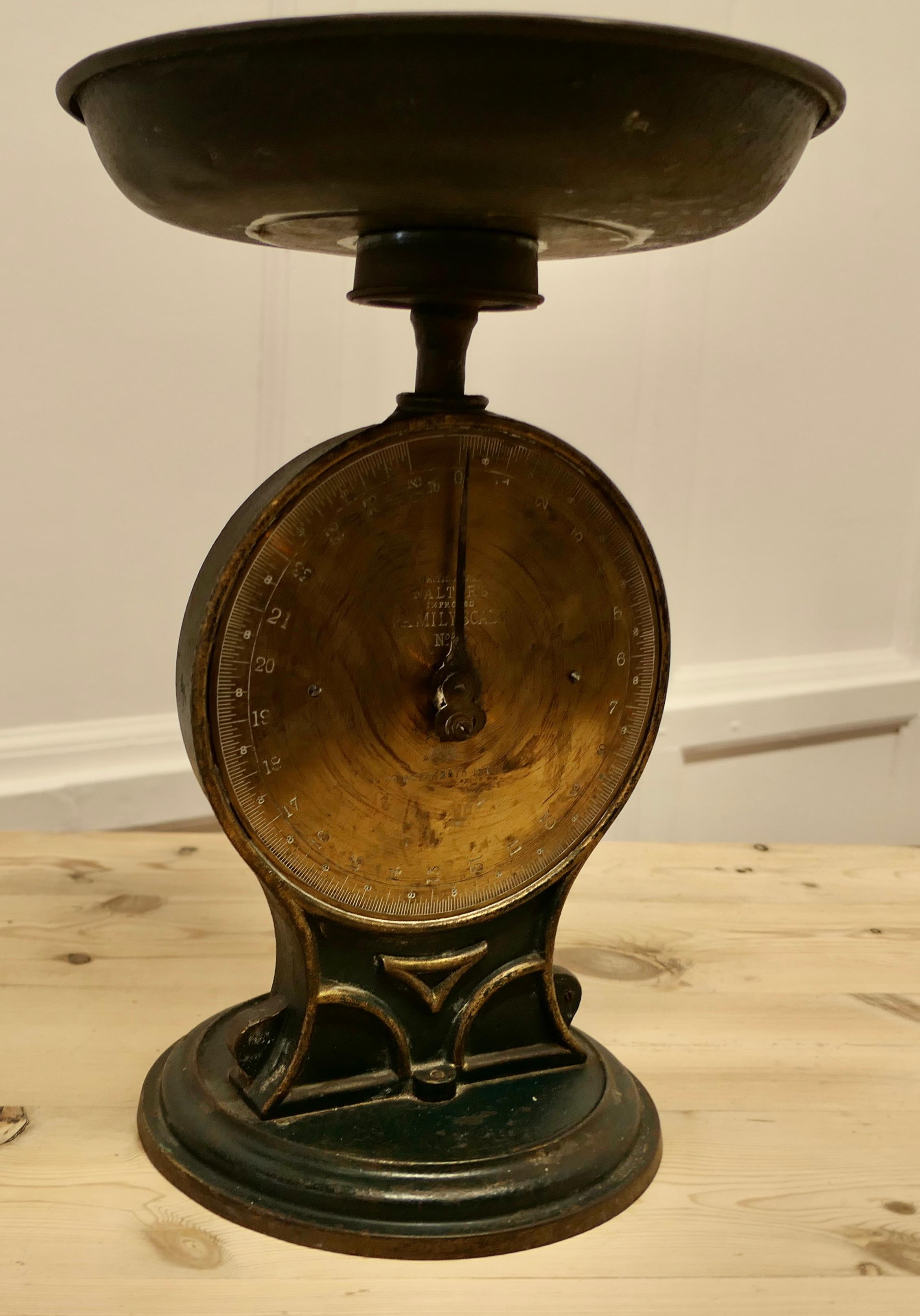 Antique Salter Family Scales  No 50
A well loved and used Family Scales, made by Salter, the cast iron body is in Dark green with Gold highlights, it has a removable tin tray on the top and a Brass face
Good Used condition and fully functional,